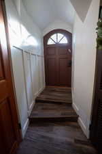 Arch-top entry door with decorative glass
