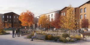 Modern architectural complex featuring diverse exterior finishes including wood paneling and dark siding