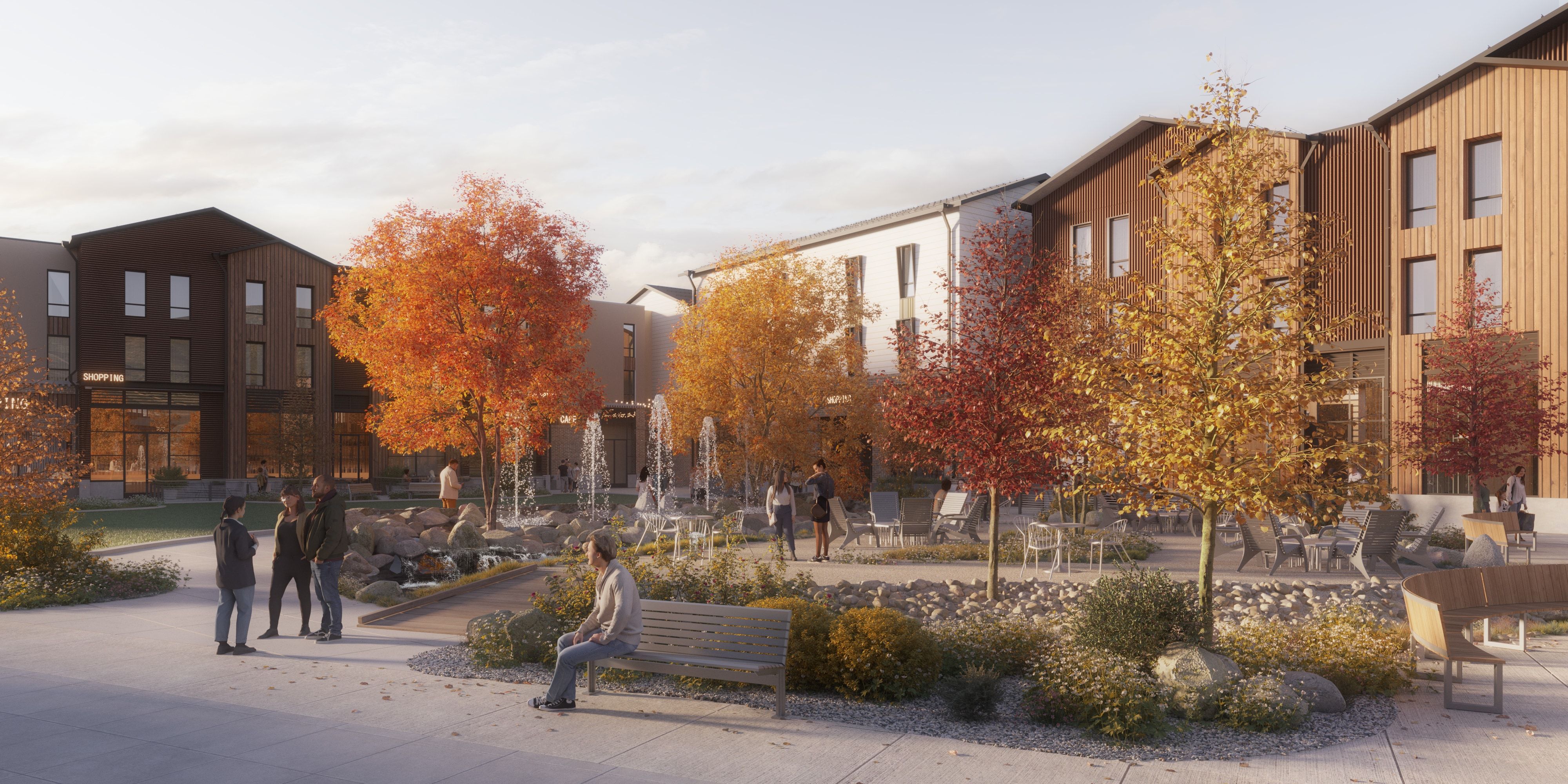 Modern residential complex featuring varied facades including wood paneling and vertical siding