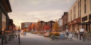 Expansive pedestrian plaza featuring outdoor seating areas and mature trees