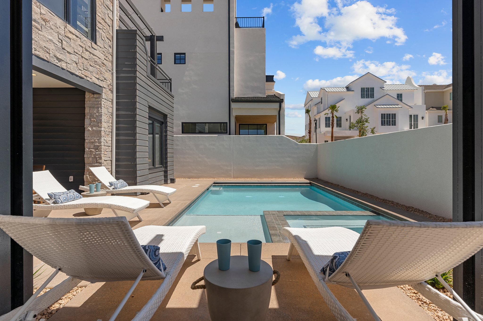 Private courtyard with a built-in swimming pool and integrated spa