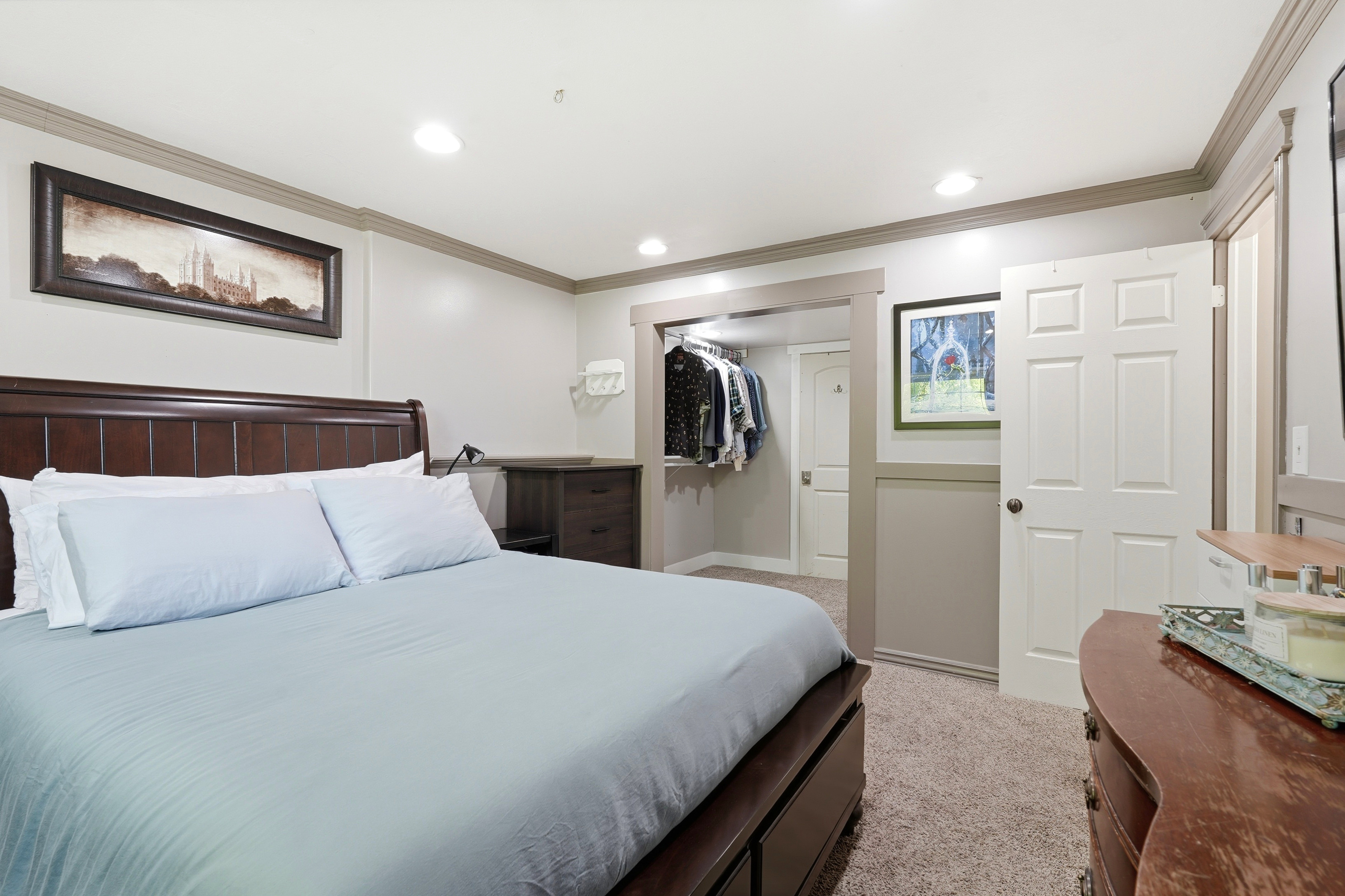 Bedroom featuring neutral wall paint, recessed lighting, and crown molding