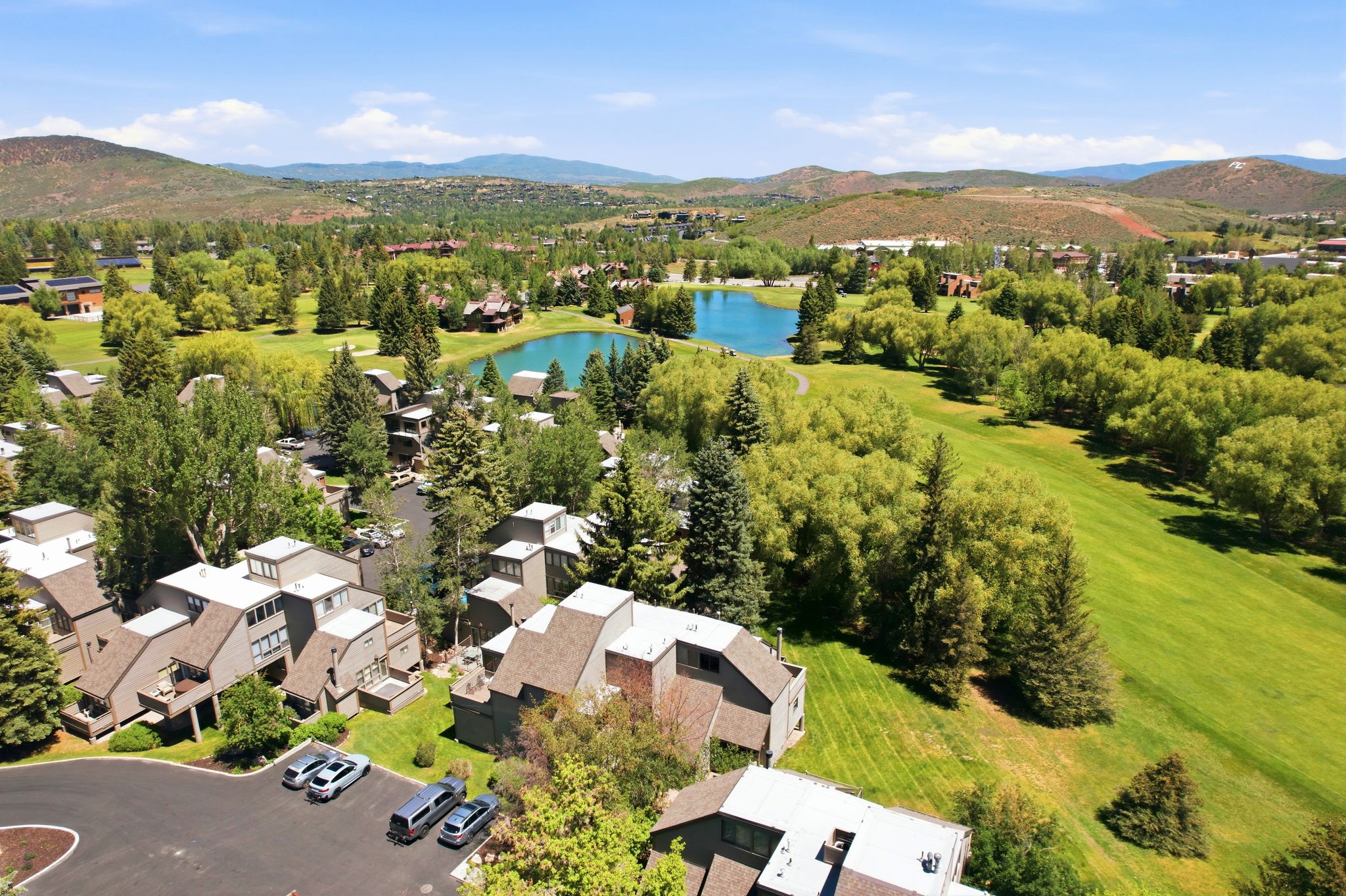 Townhome community featuring multi-level architecture and private balconies