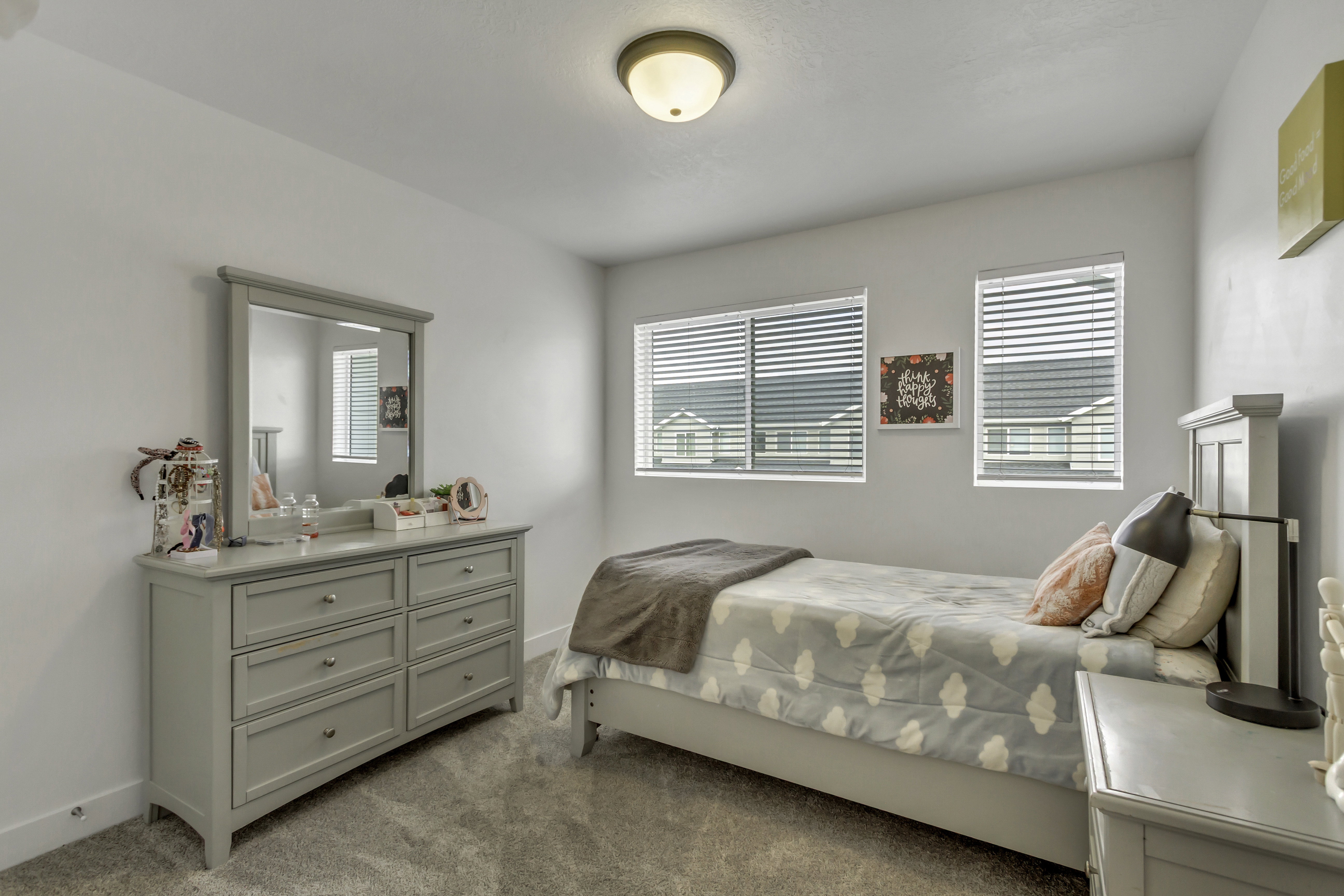 Room featuring light gray carpet flooring and white painted walls