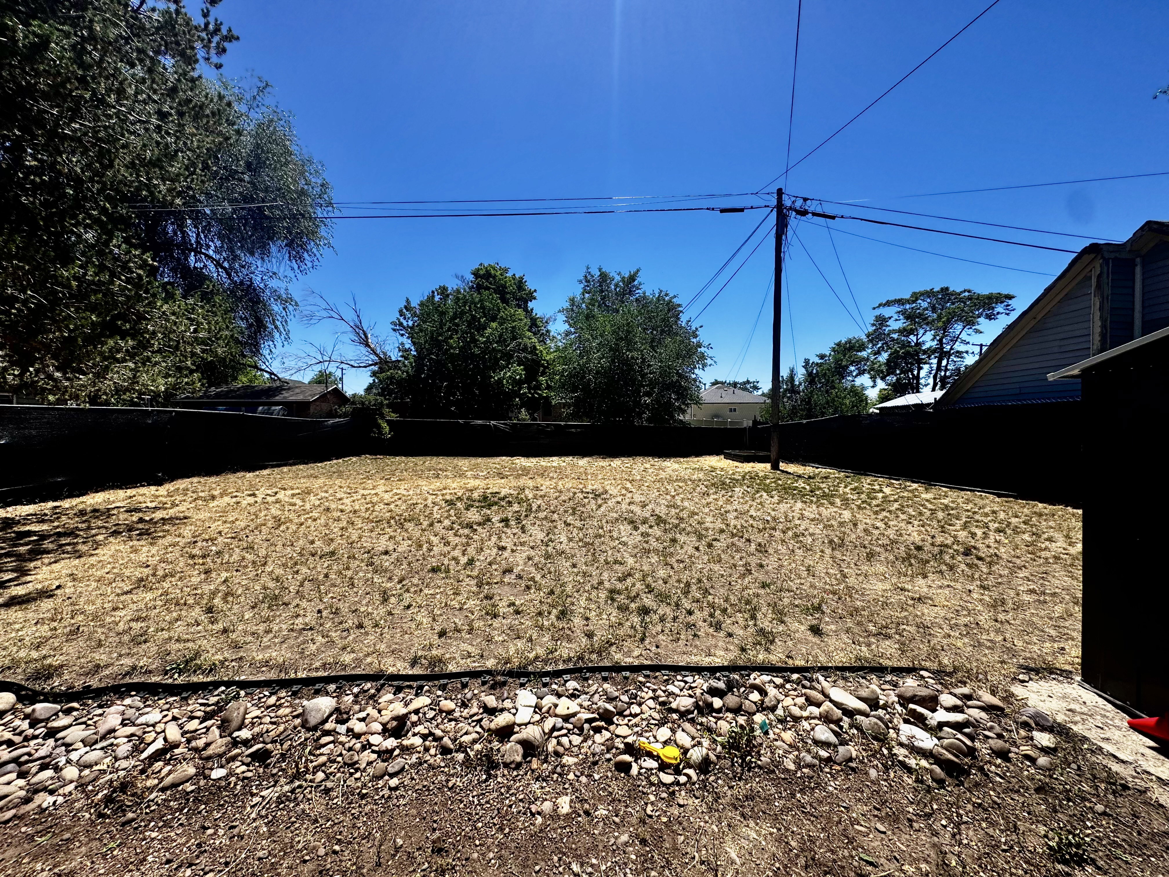 Expansive, fenced Backyard