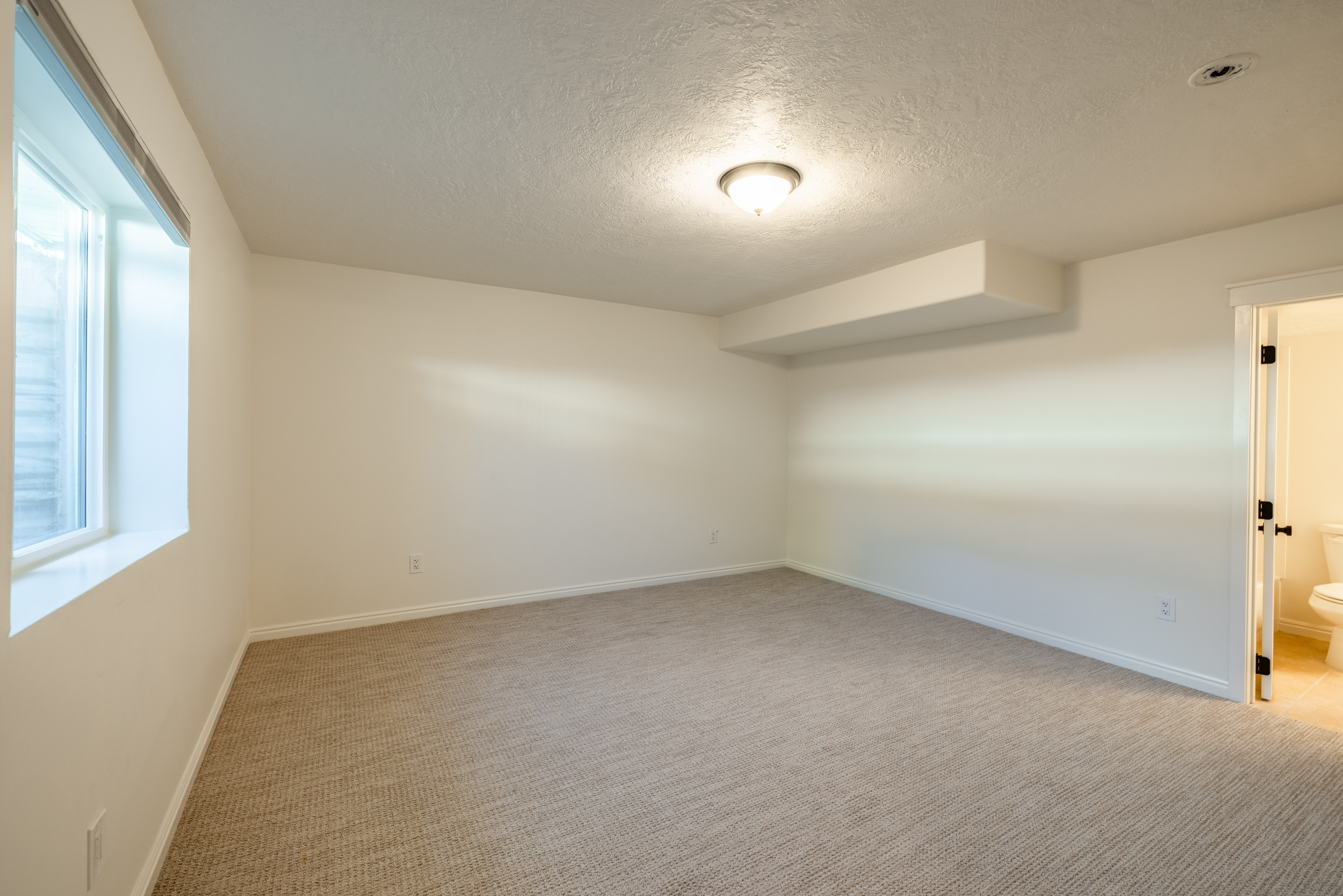 Basement bedroom with en suite bath