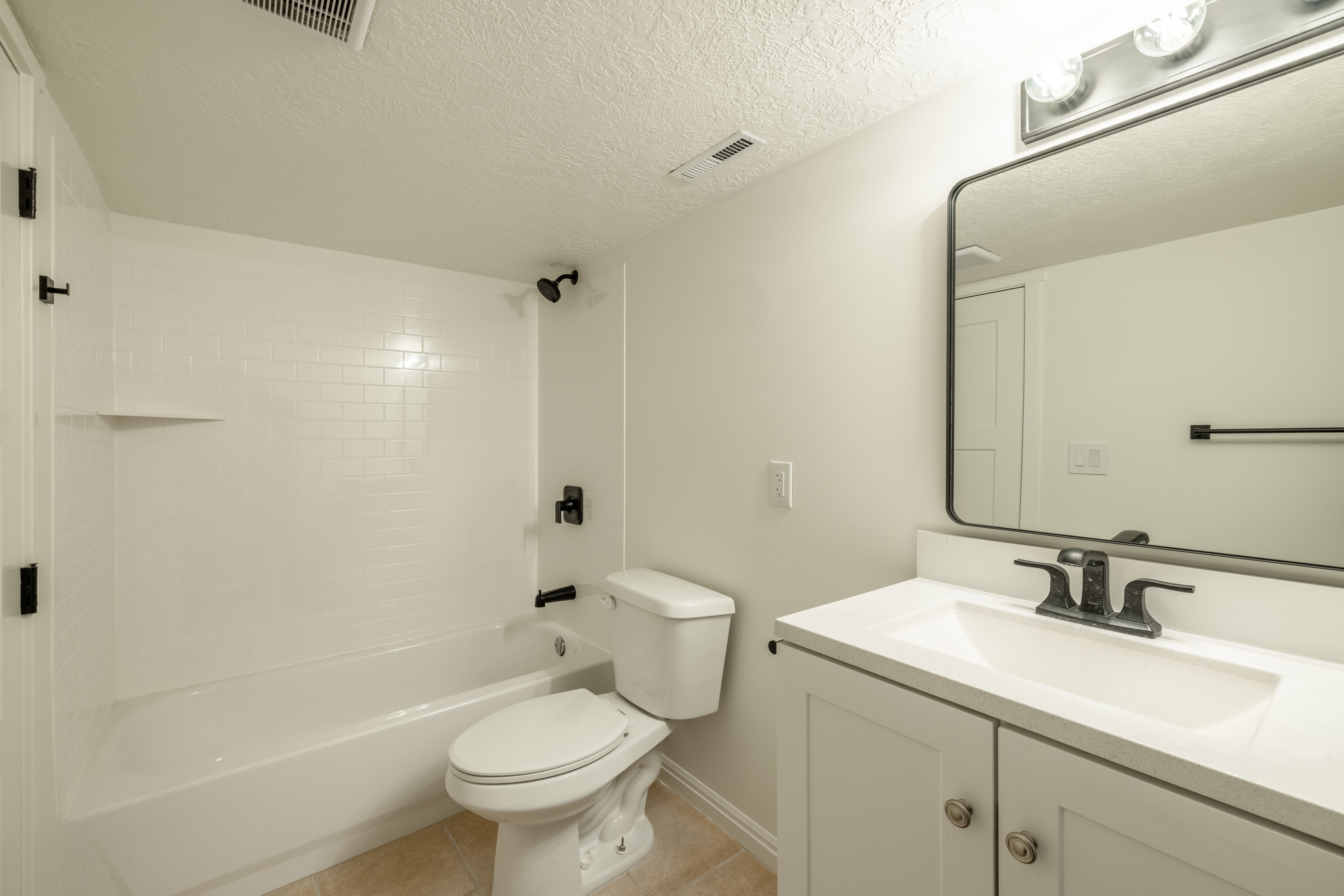 Bathroom connected to bedroom in basement