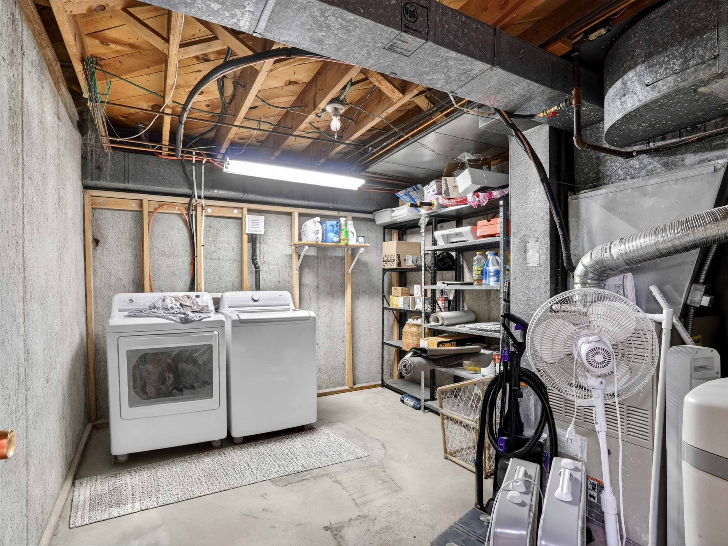 Utility room with gas and electric dryer hookups