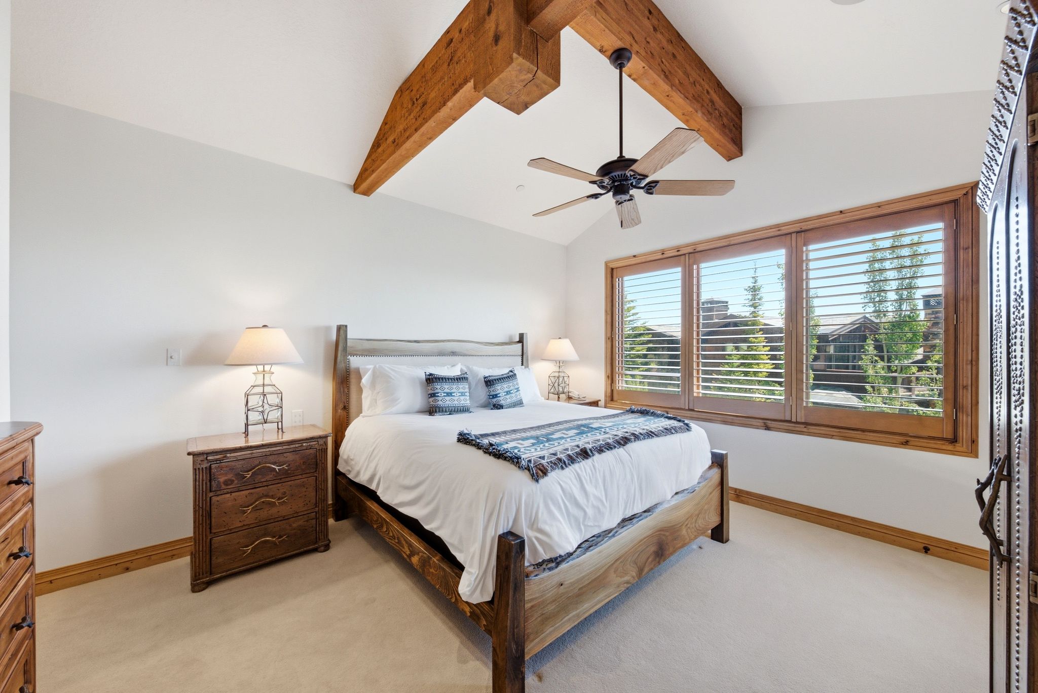 Vaulted ceilings featuring exposed wood beams