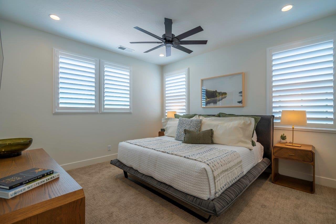 Plush carpet flooring complements crisp white walls
