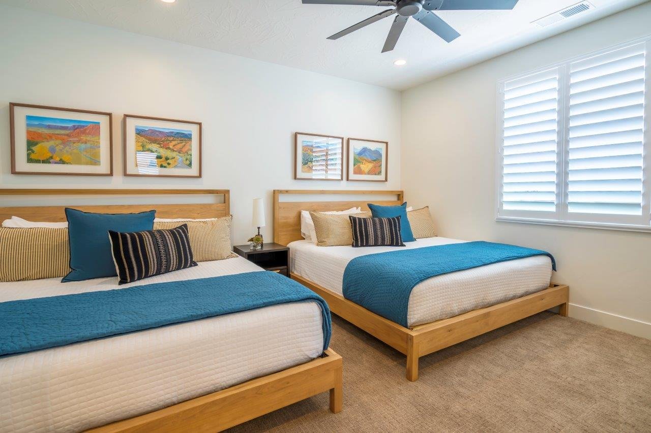 Recessed lighting, ceiling fan, plantation shutters, wall-to-wall carpeting, and wood-frame beds