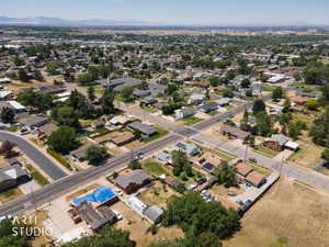 Aerial perspective showcasing a residential neighborhood with established homes and mature trees