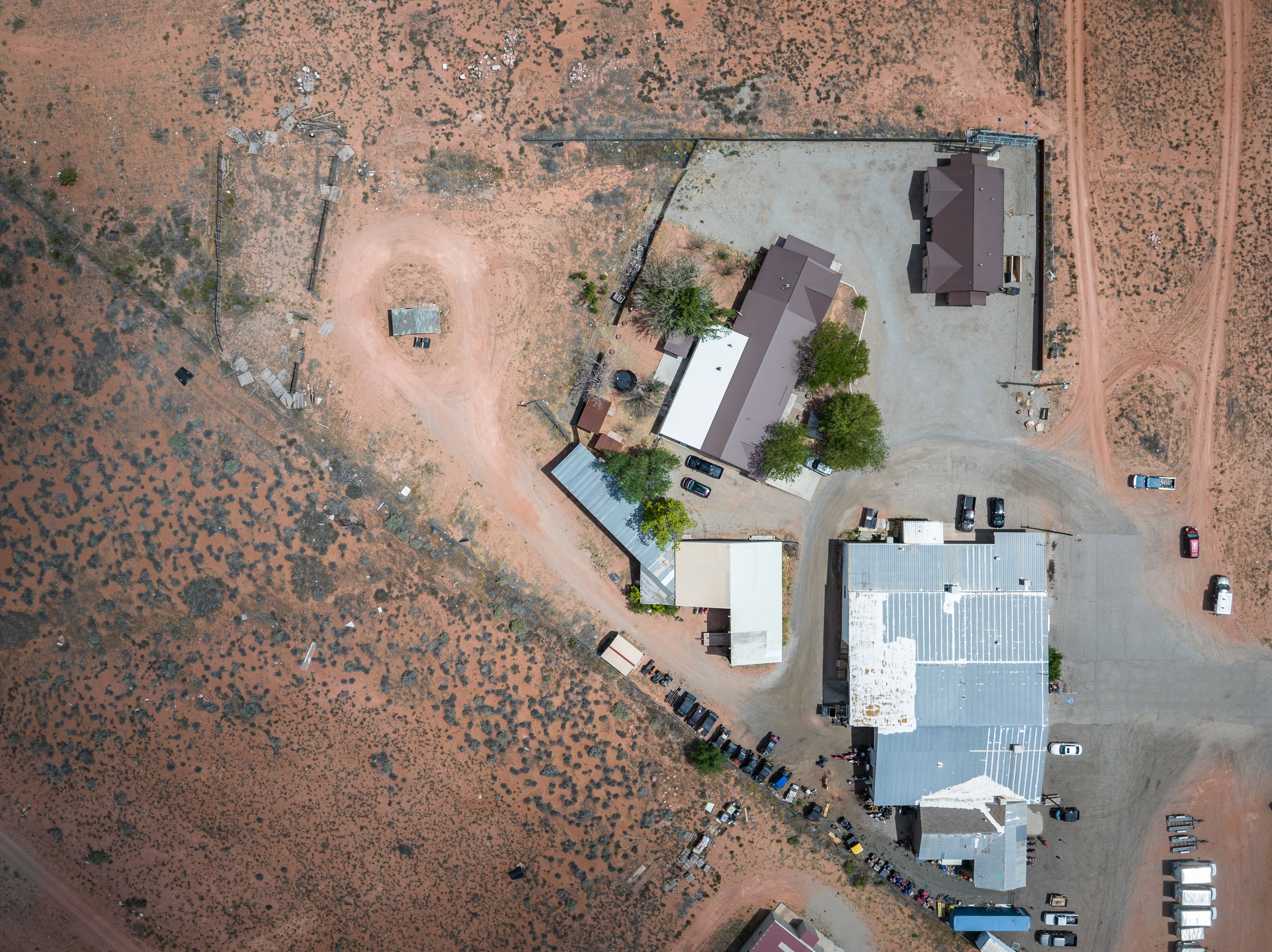 Expansive aerial view showcasing multiple structures on a large parcel of land