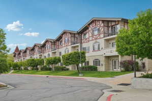 Architectural facade featuring decorative half-timbering and balconies
