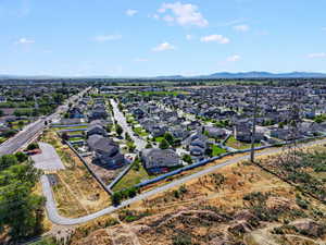 Expansive residential neighborhood featuring numerous single-family homes with pitched roofs and established landscaping