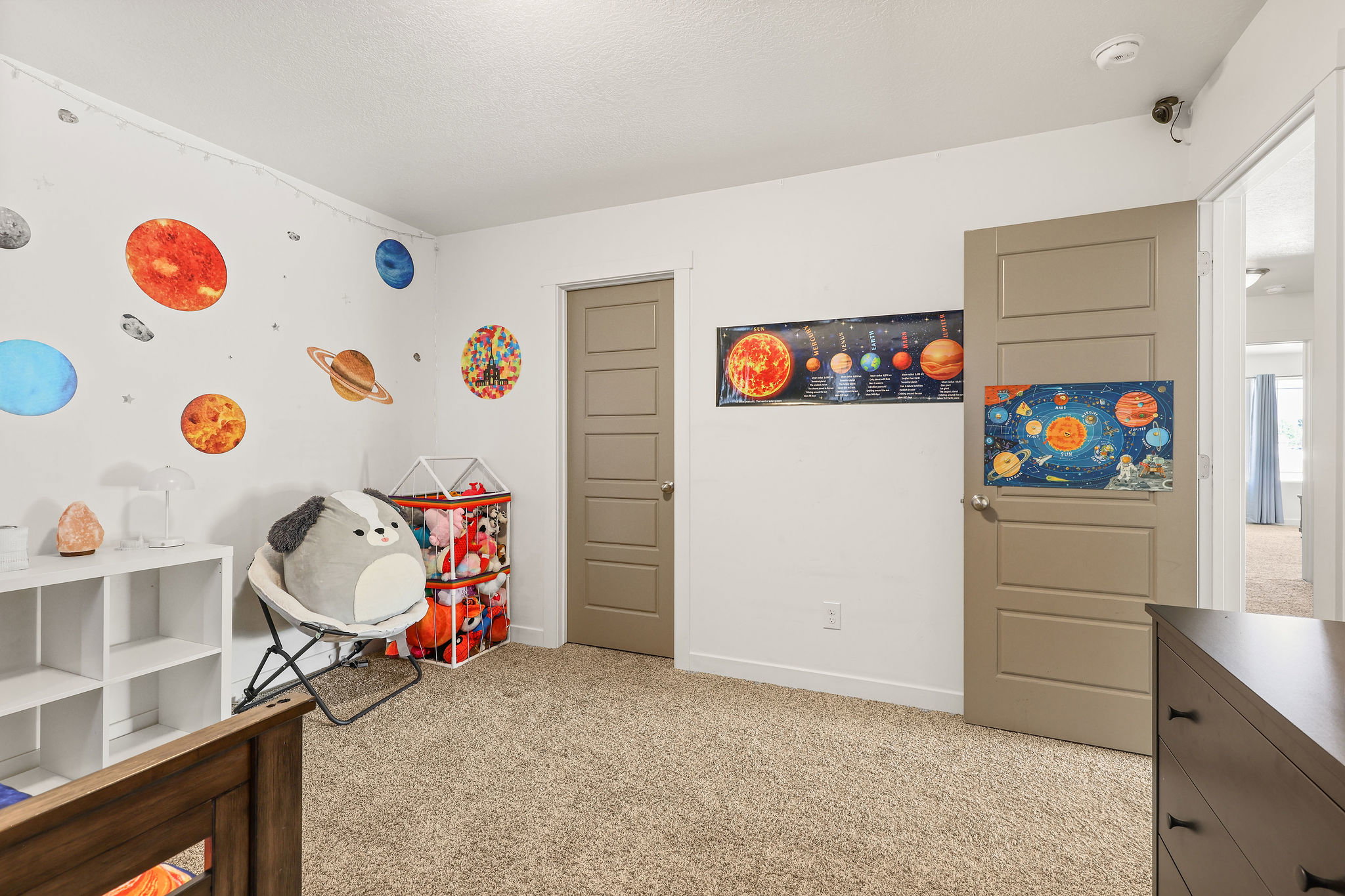 Carpeted room with a solid-core interior door
