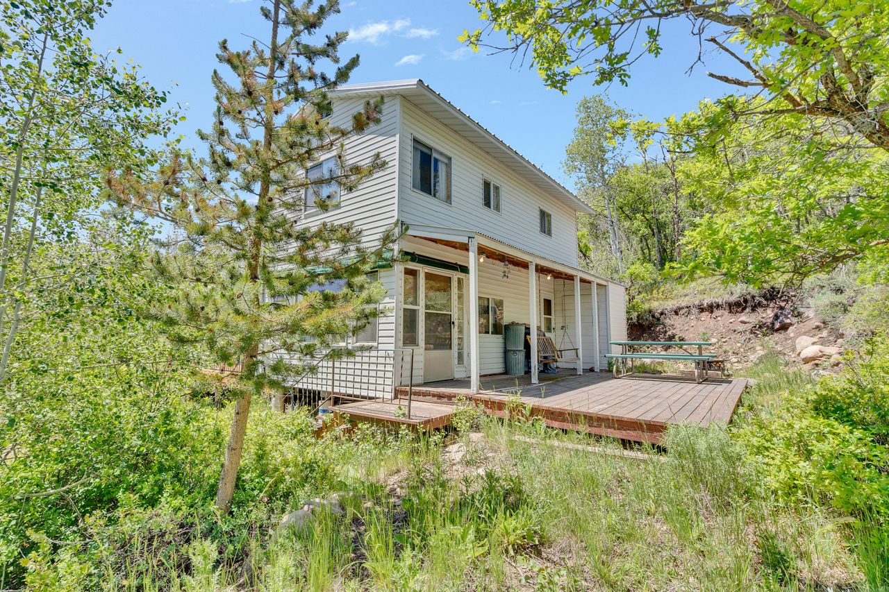 Two-story exterior with white siding