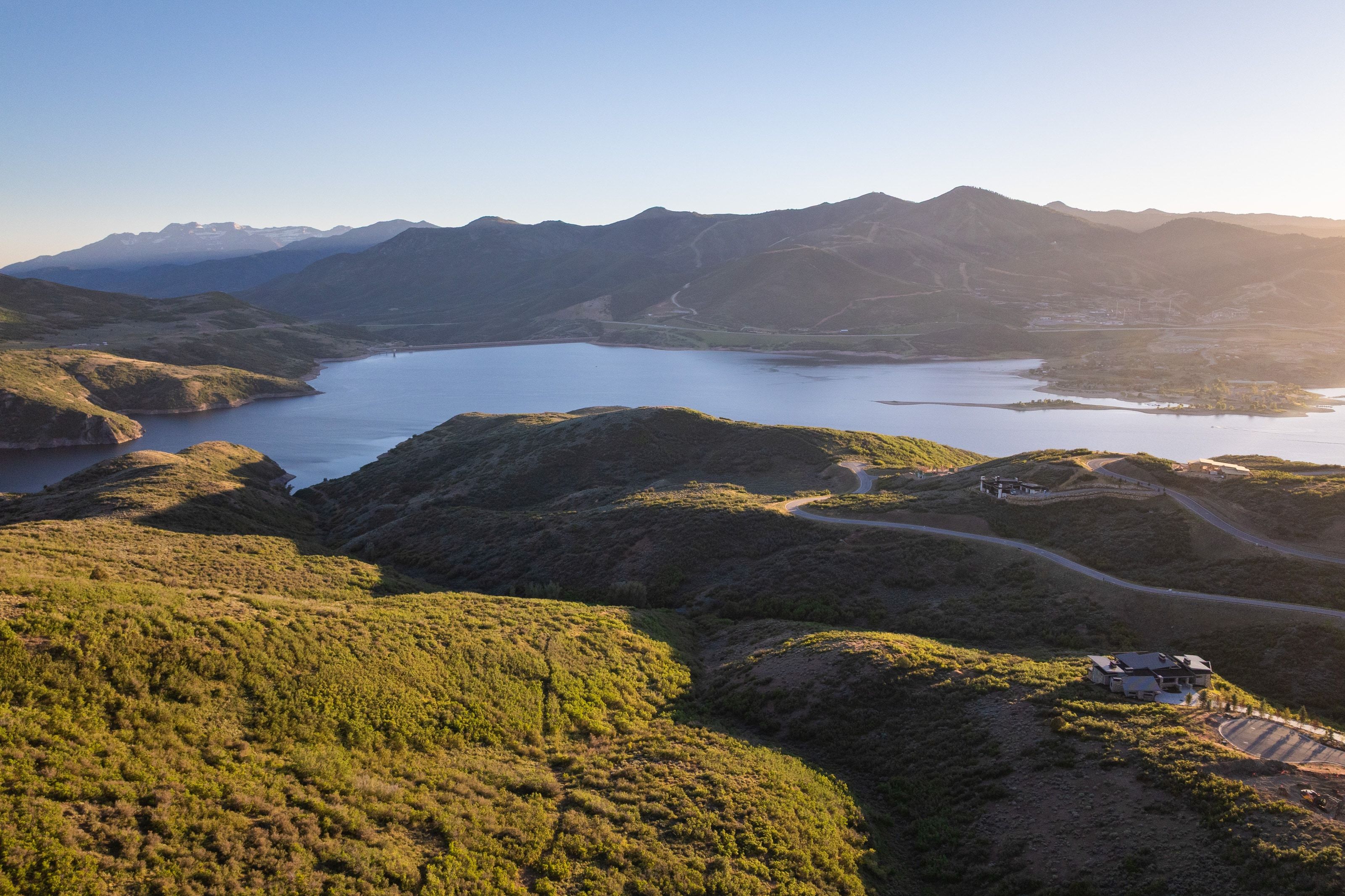 Expansive mountain landscape with a large body of water