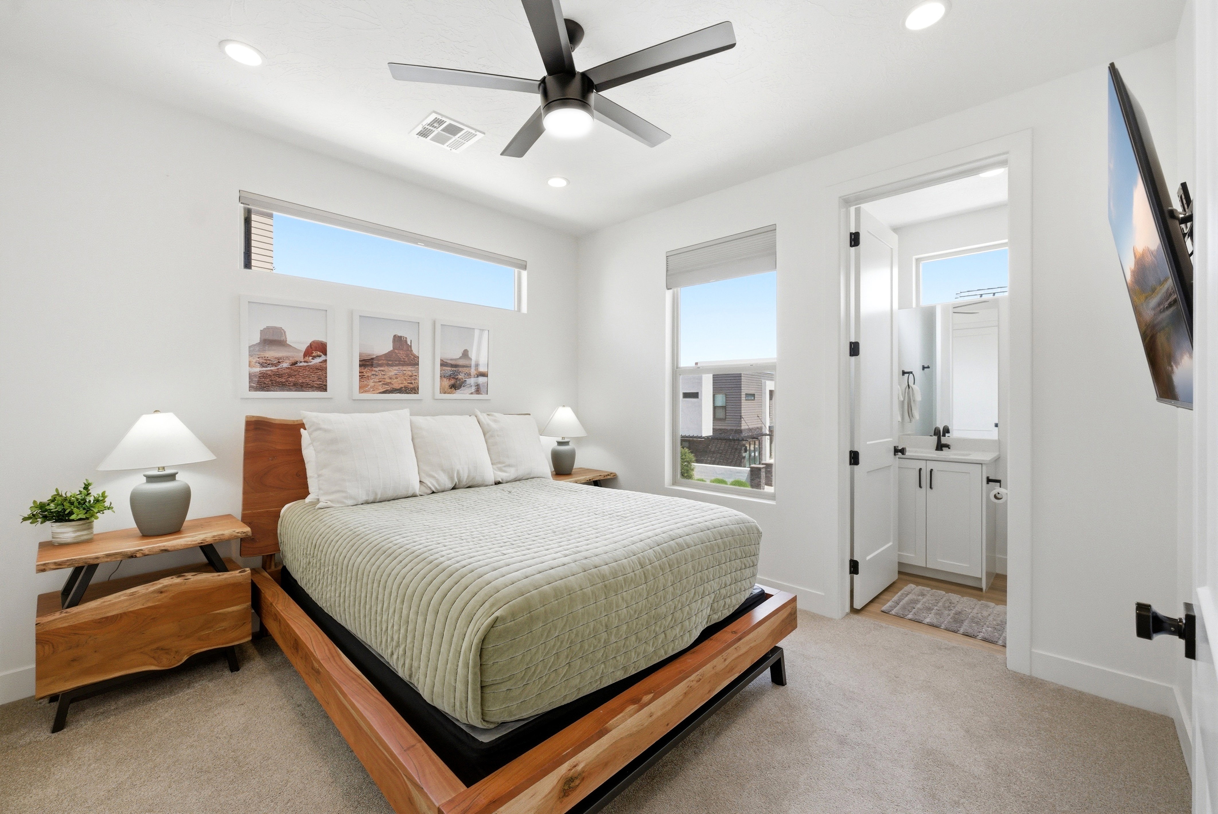 Bedroom featuring a ceiling fan with integrated lighting, recessed lighting, and carpeting