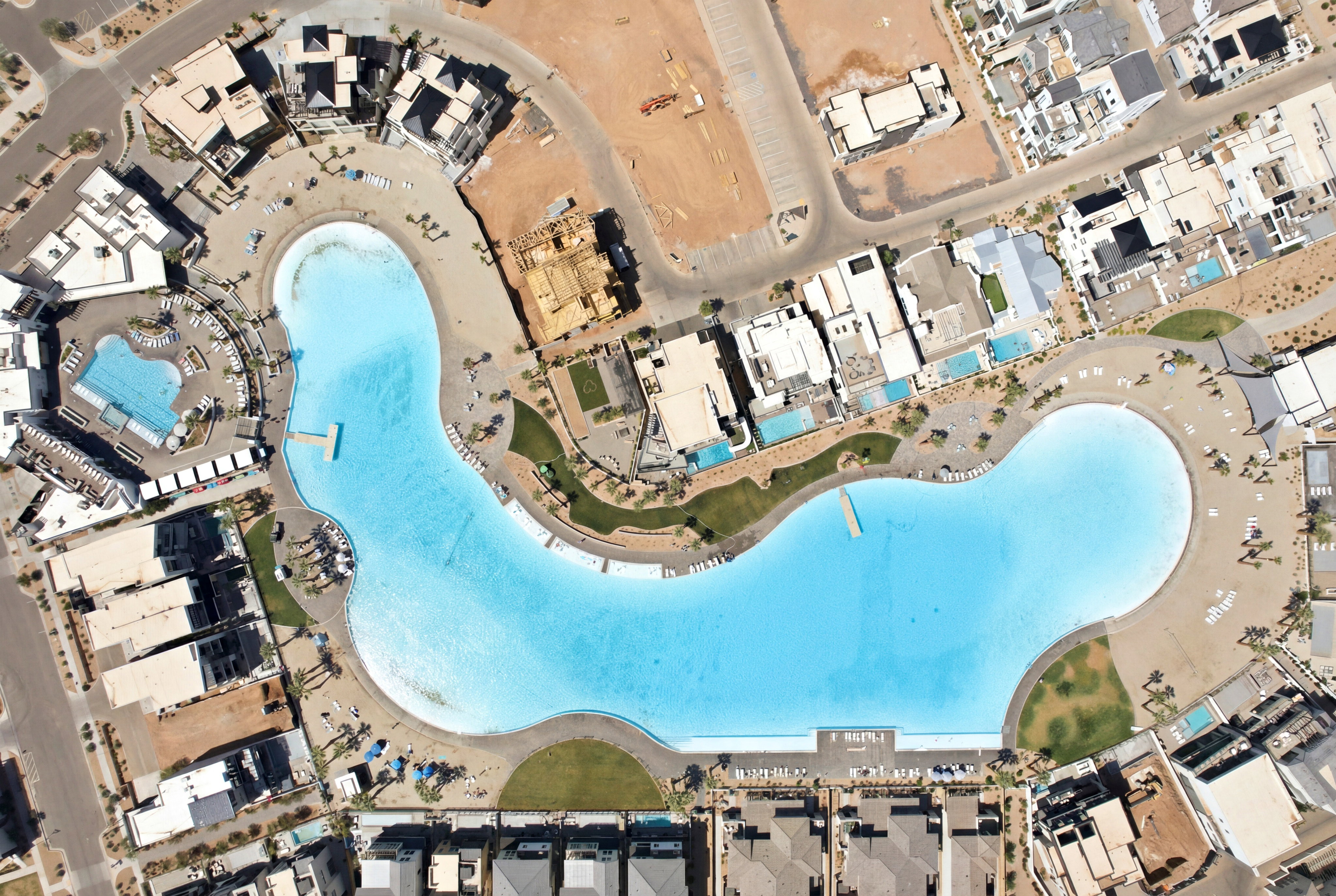 Expansive recreational lagoon surrounded by residential properties