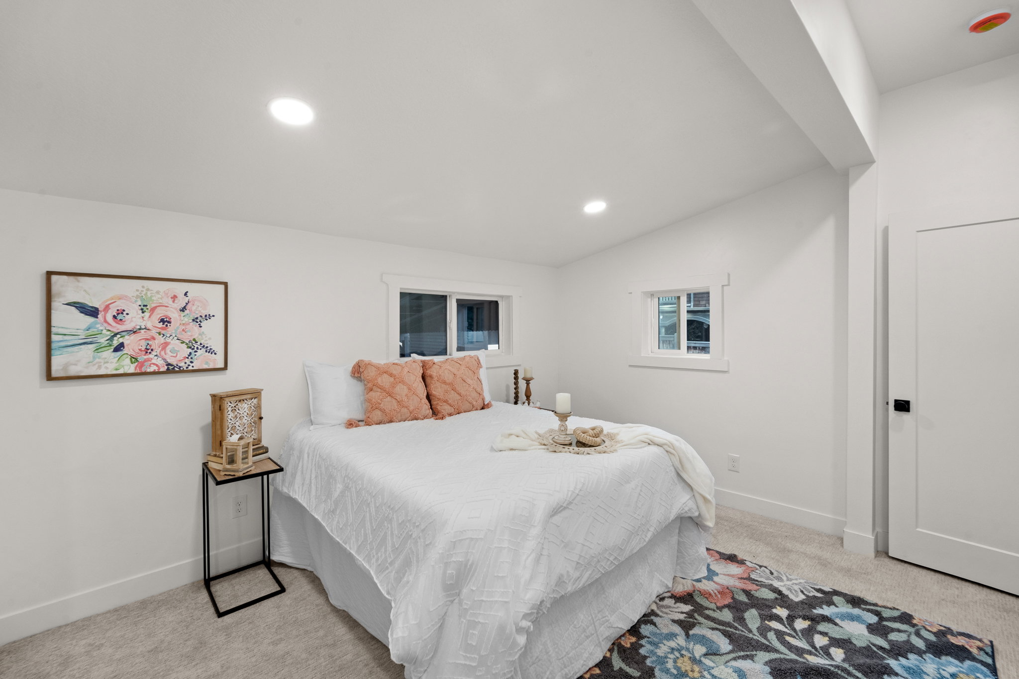 Bright bedroom featuring recessed lighting and wall-to-wall carpeting