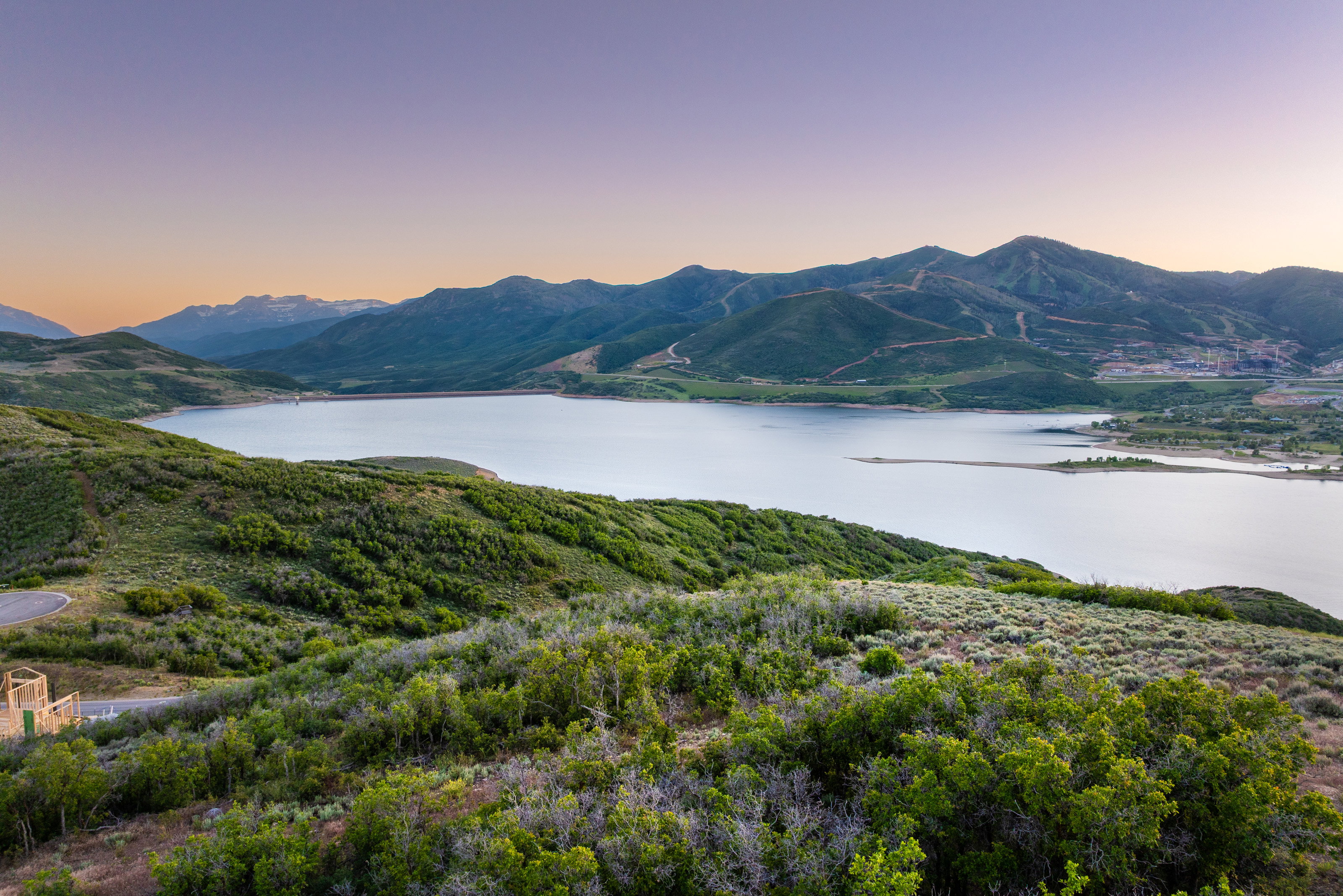 Expansive mountain and lake landscape
