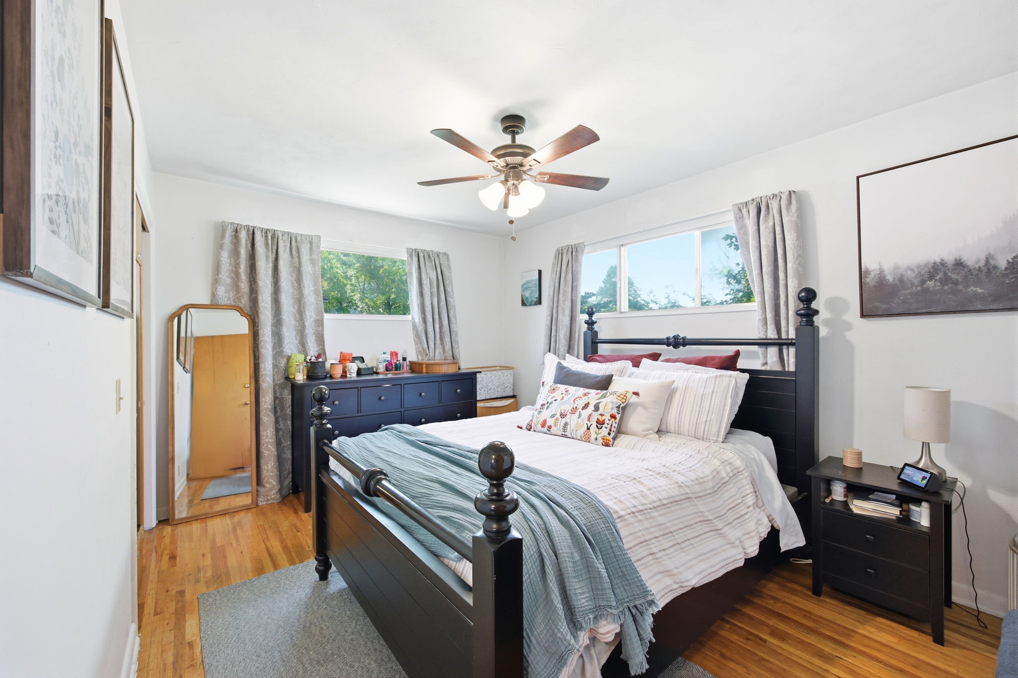 Hardwood-finish flooring and white walls