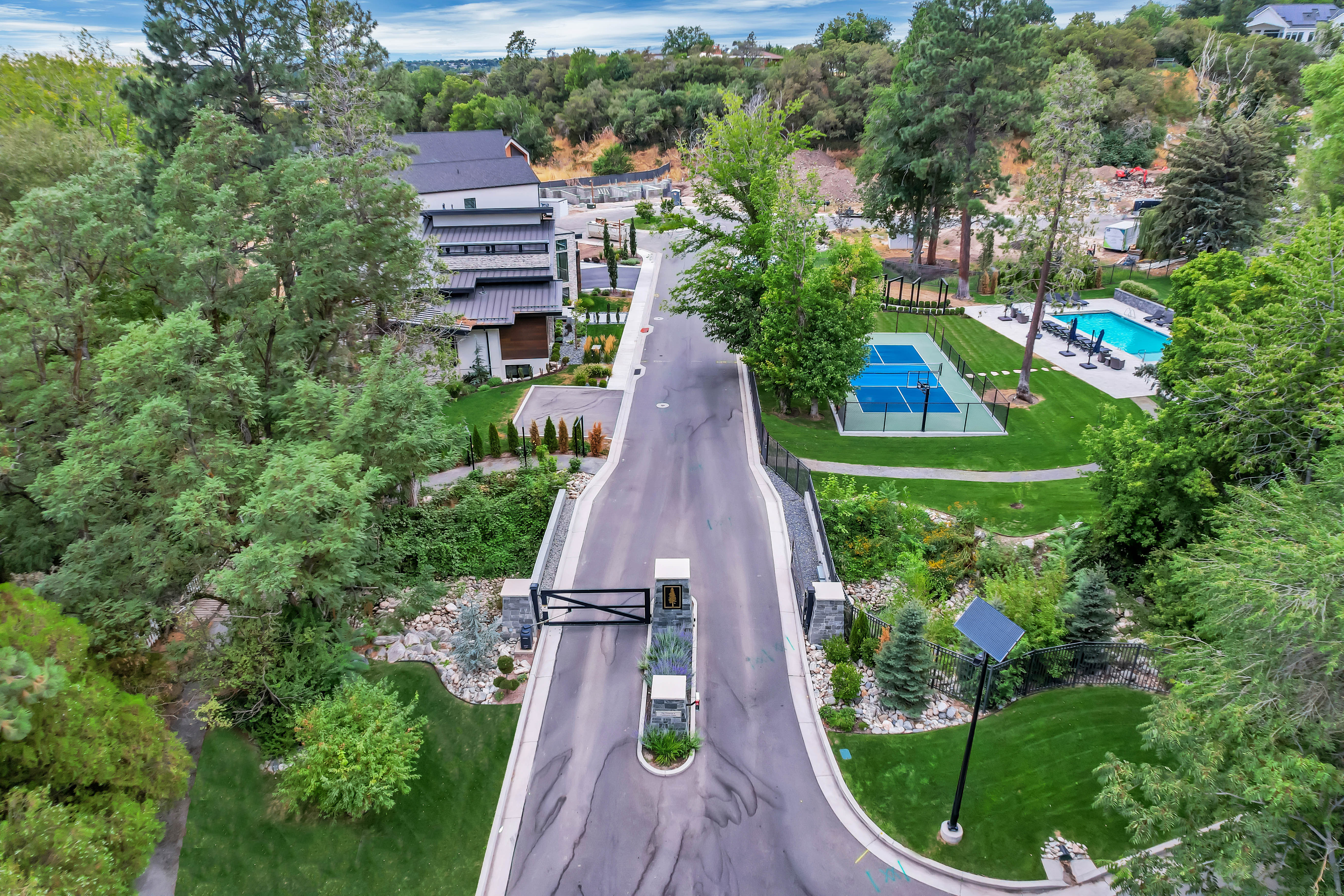 Gated entry road with stone columns