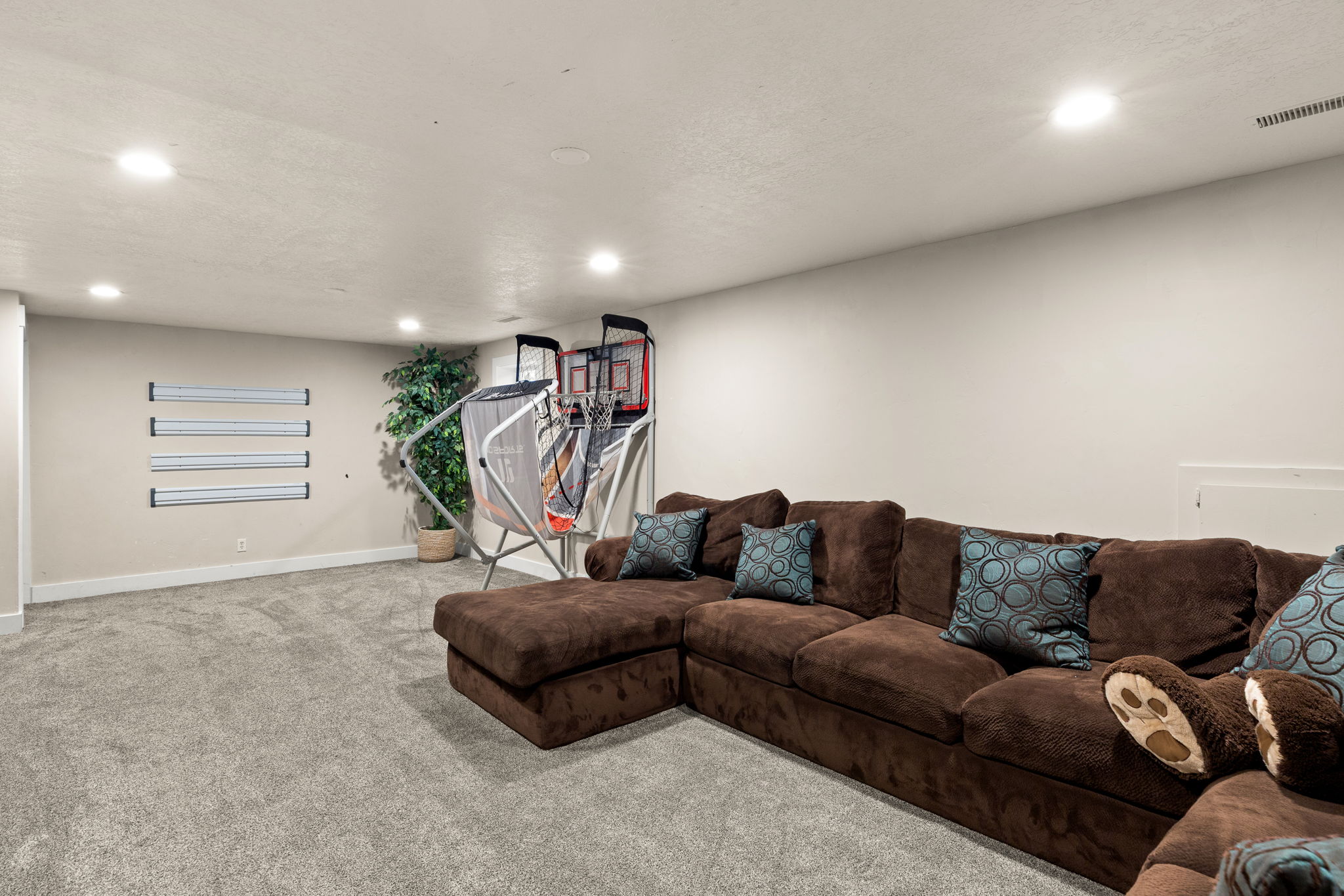 Lots of space for Family Activities!  Light Window Wells!