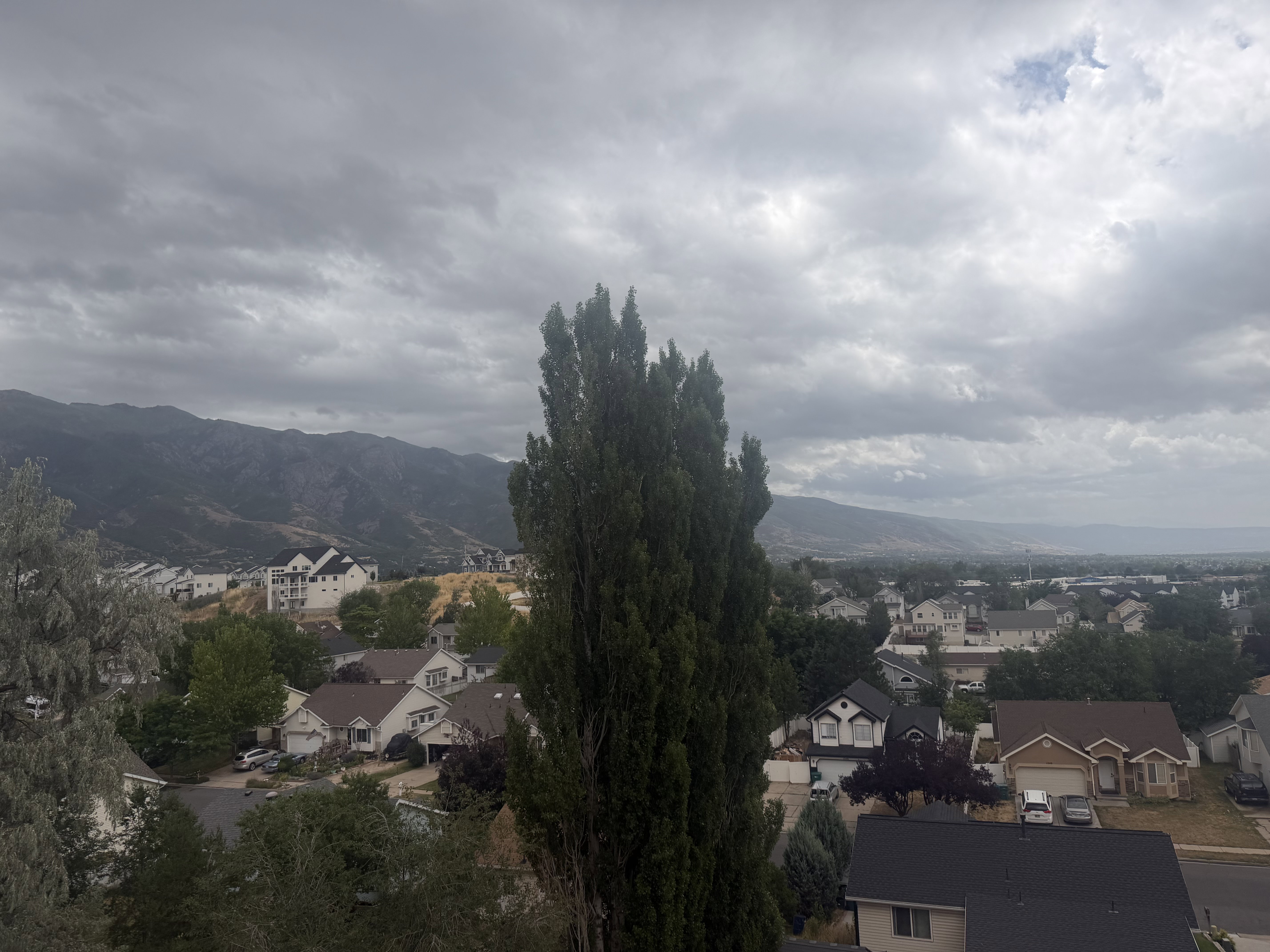 Mountain backdrop with surrounding residential area
