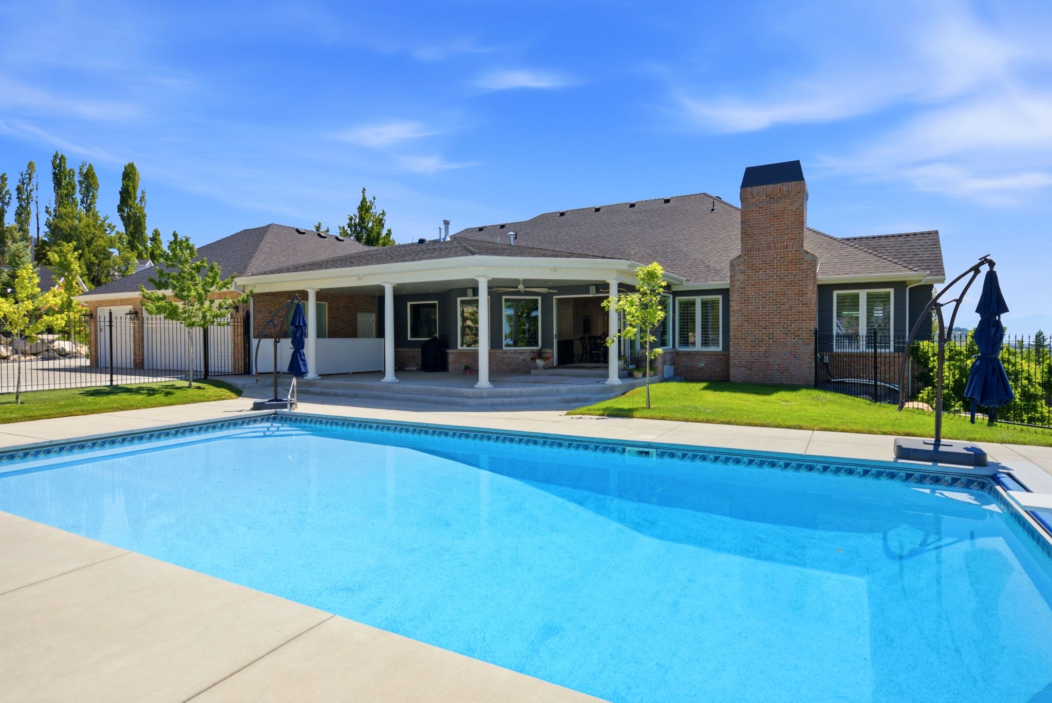 Outdoor swimming pool with concrete surround