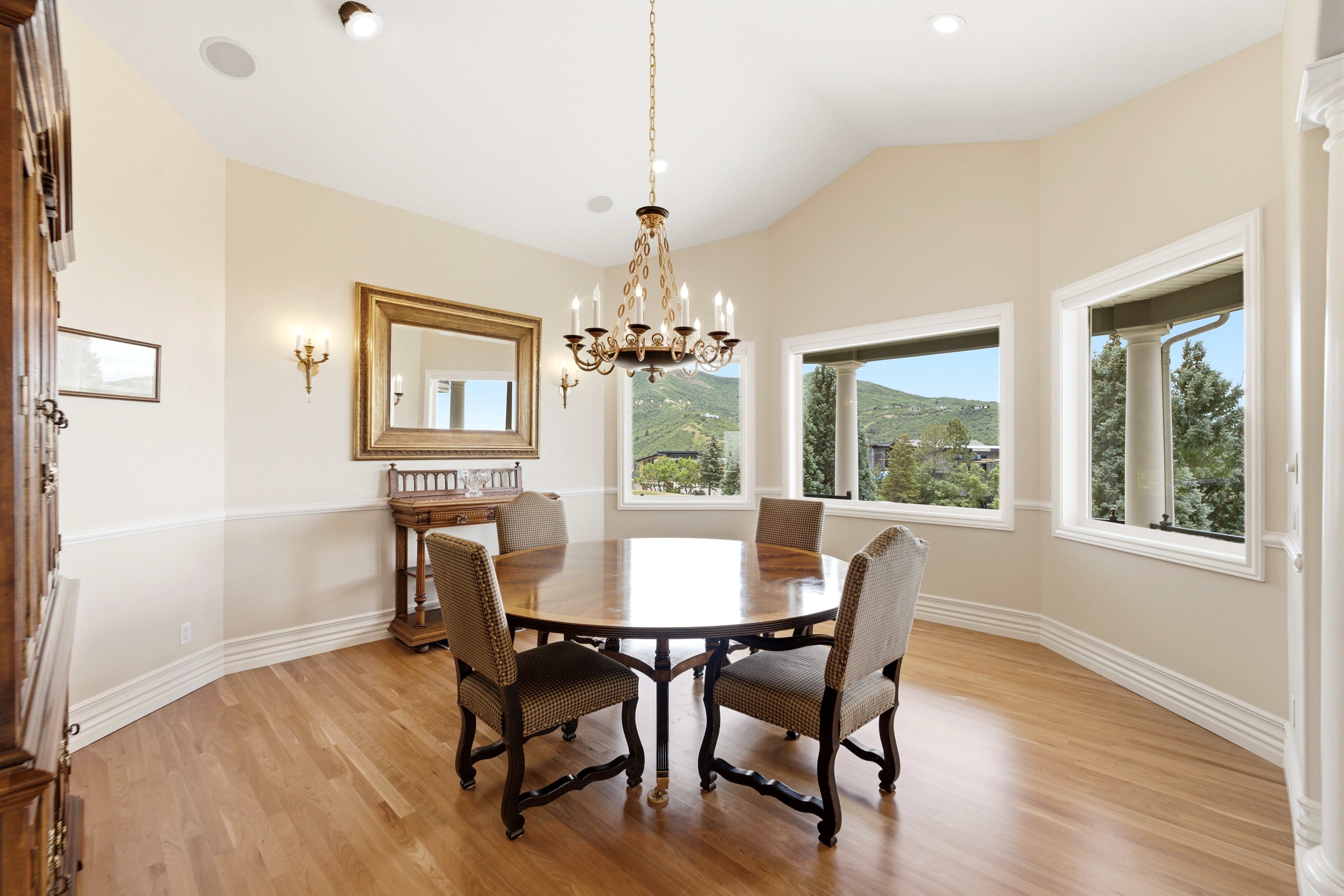 Bright interior space with large windows showcasing natural scenery