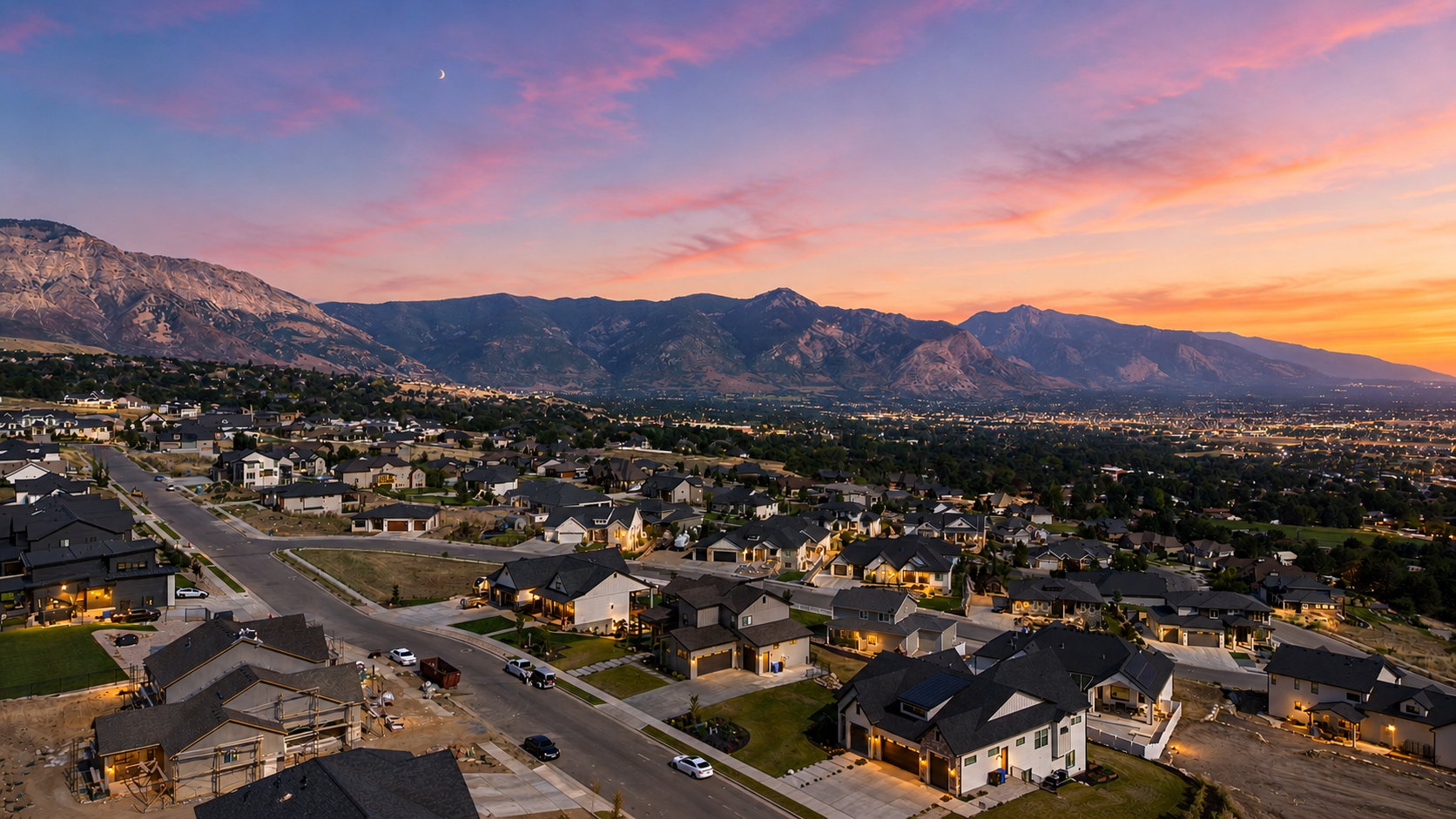 Expansive neighborhood featuring a mountainous backdrop and diverse residential architecture