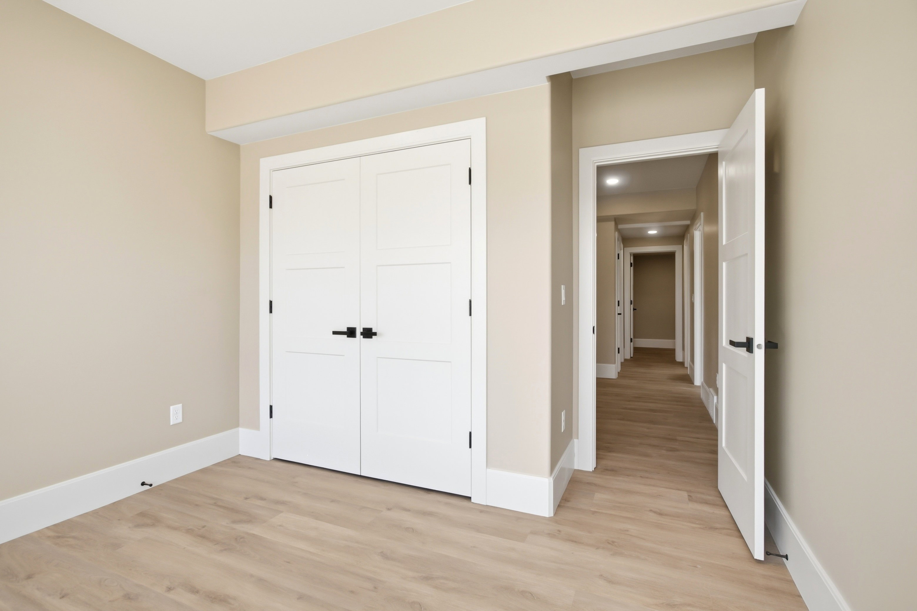Neutral wall paint with crisp white trim
