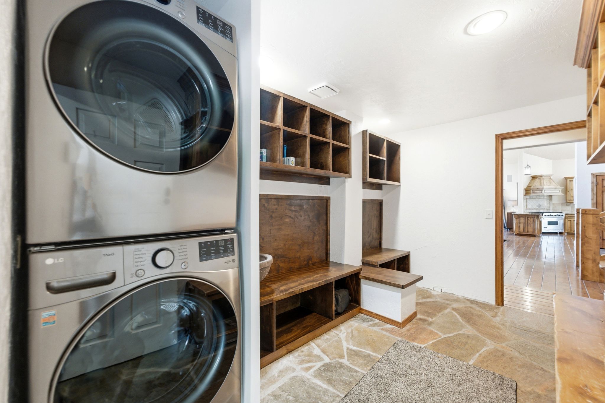 Integrated stackable laundry appliances