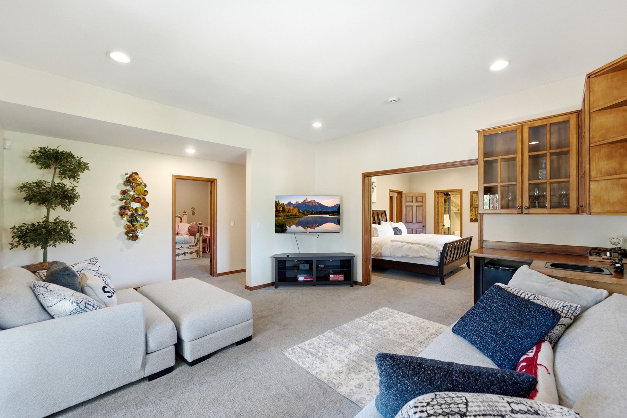 Open-concept living area featuring recessed lighting and wall-to-wall carpeting