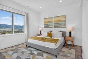 Expansive window offering broad mountain and valley scenery