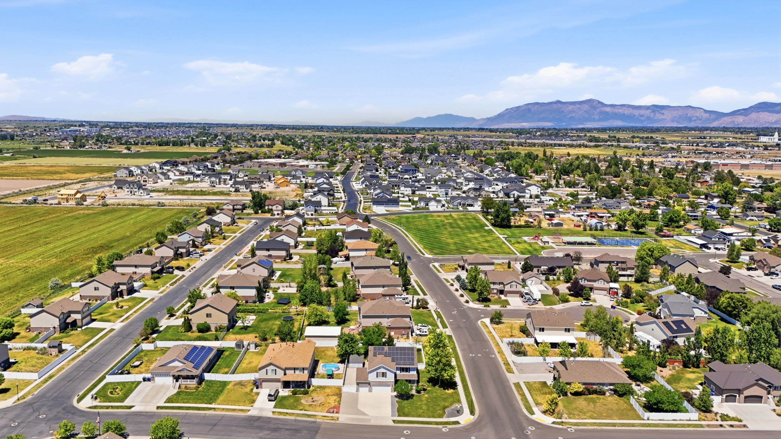 Expansive aerial showcasing a residential neighborhood with a variety of home styles