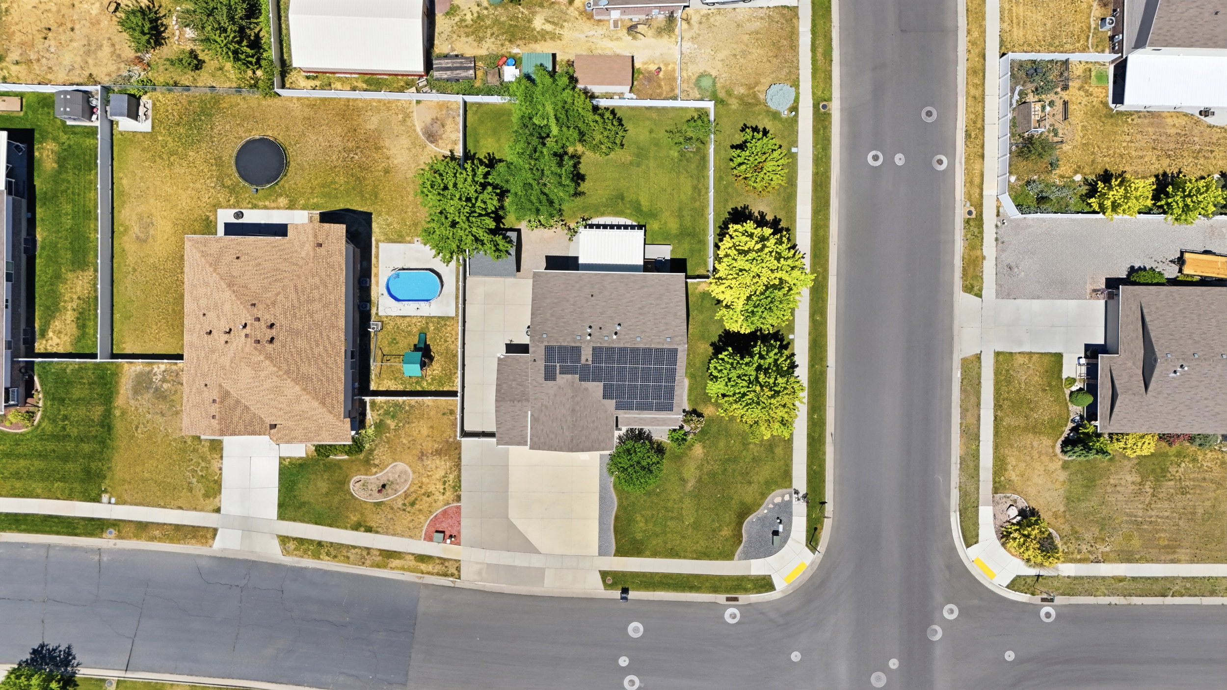 Aerial view highlighting the property's corner lot position