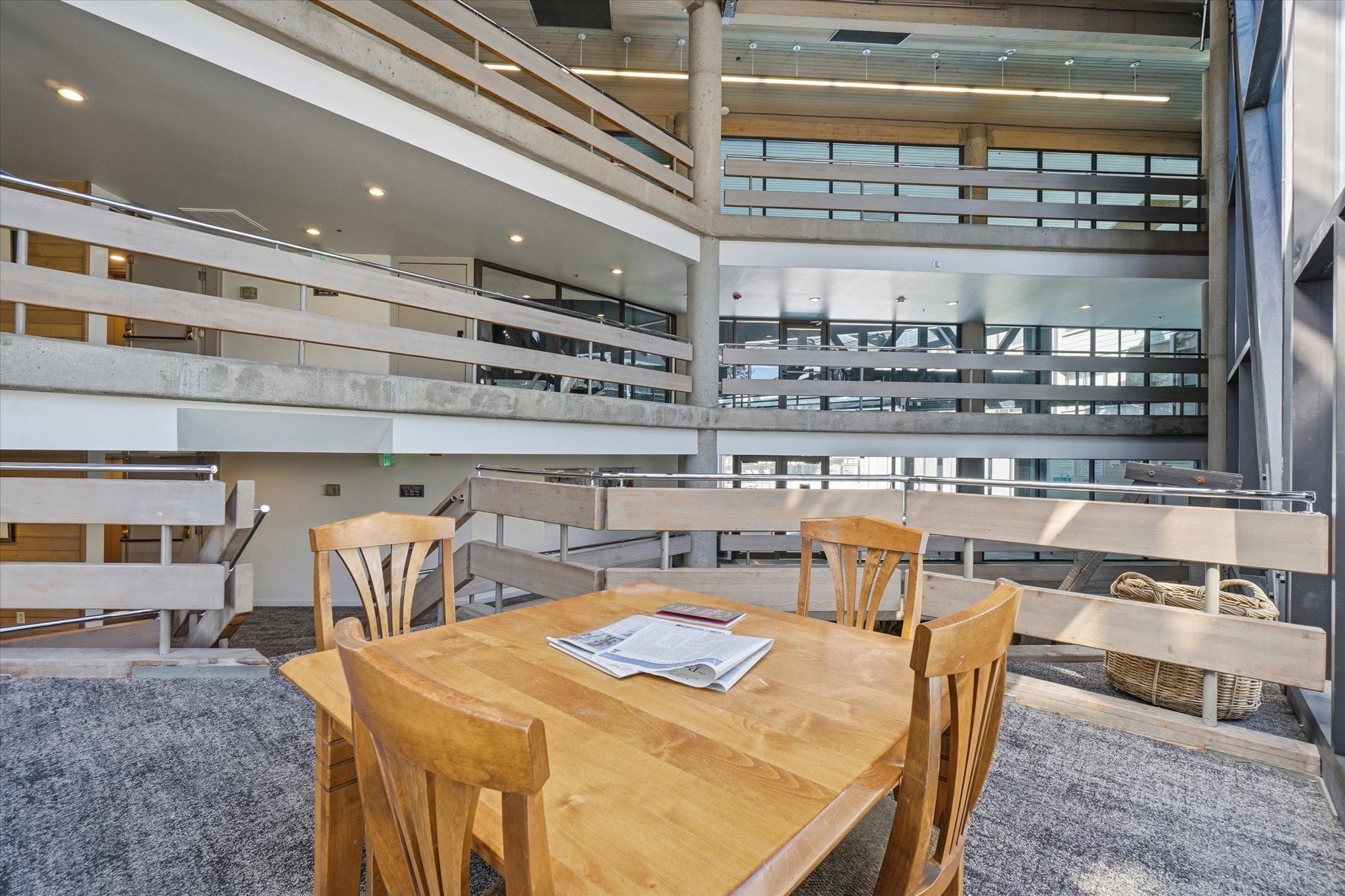 Multi-level interior space featuring an open-concept design with multiple overlooks