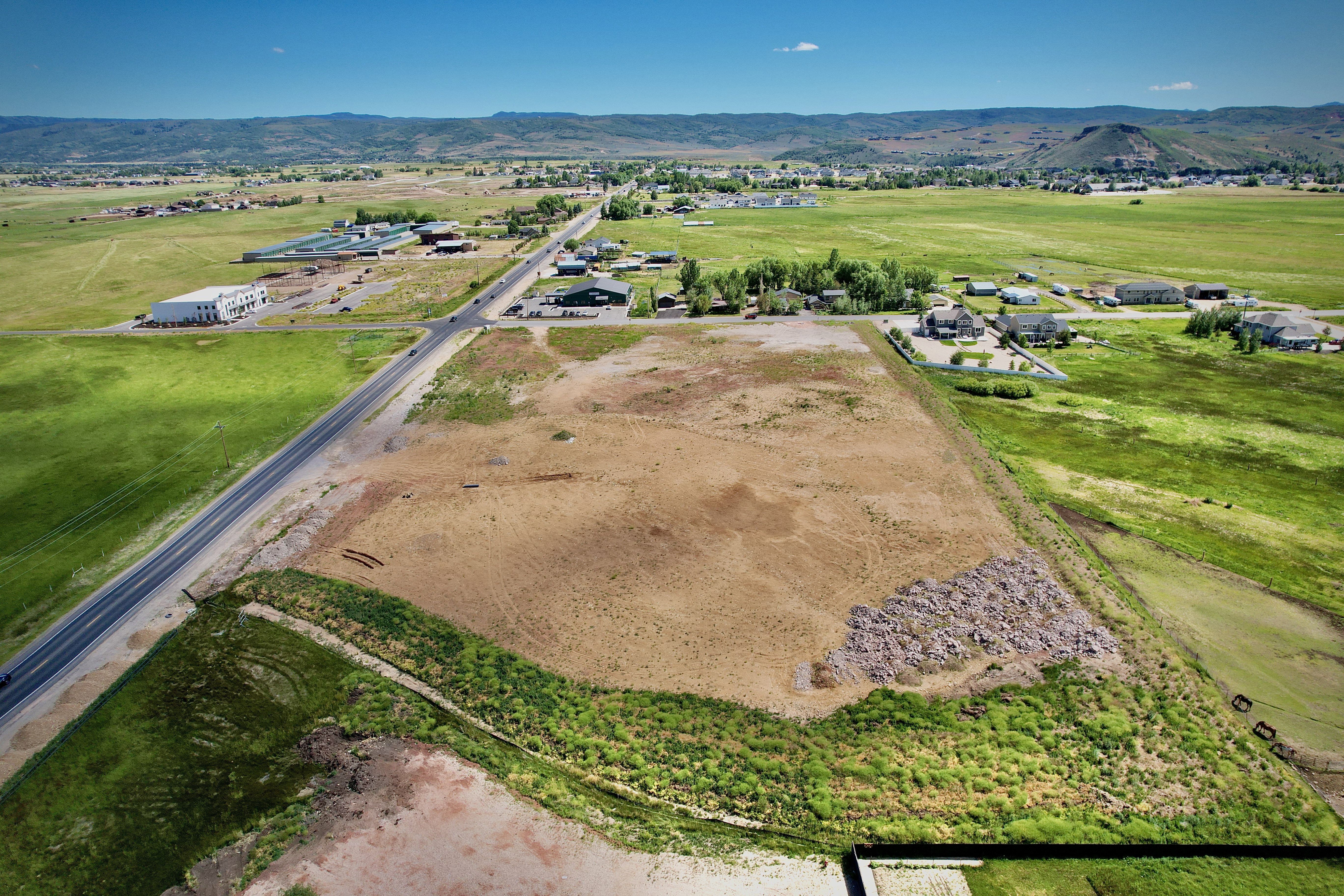 Expansive undeveloped land featuring a cleared, level building site