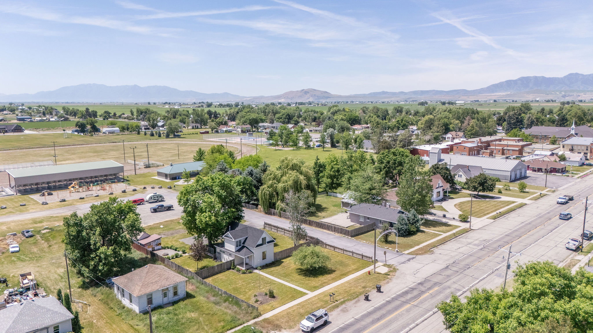 Aerial perspective showcasing a residential street with diverse housing styles