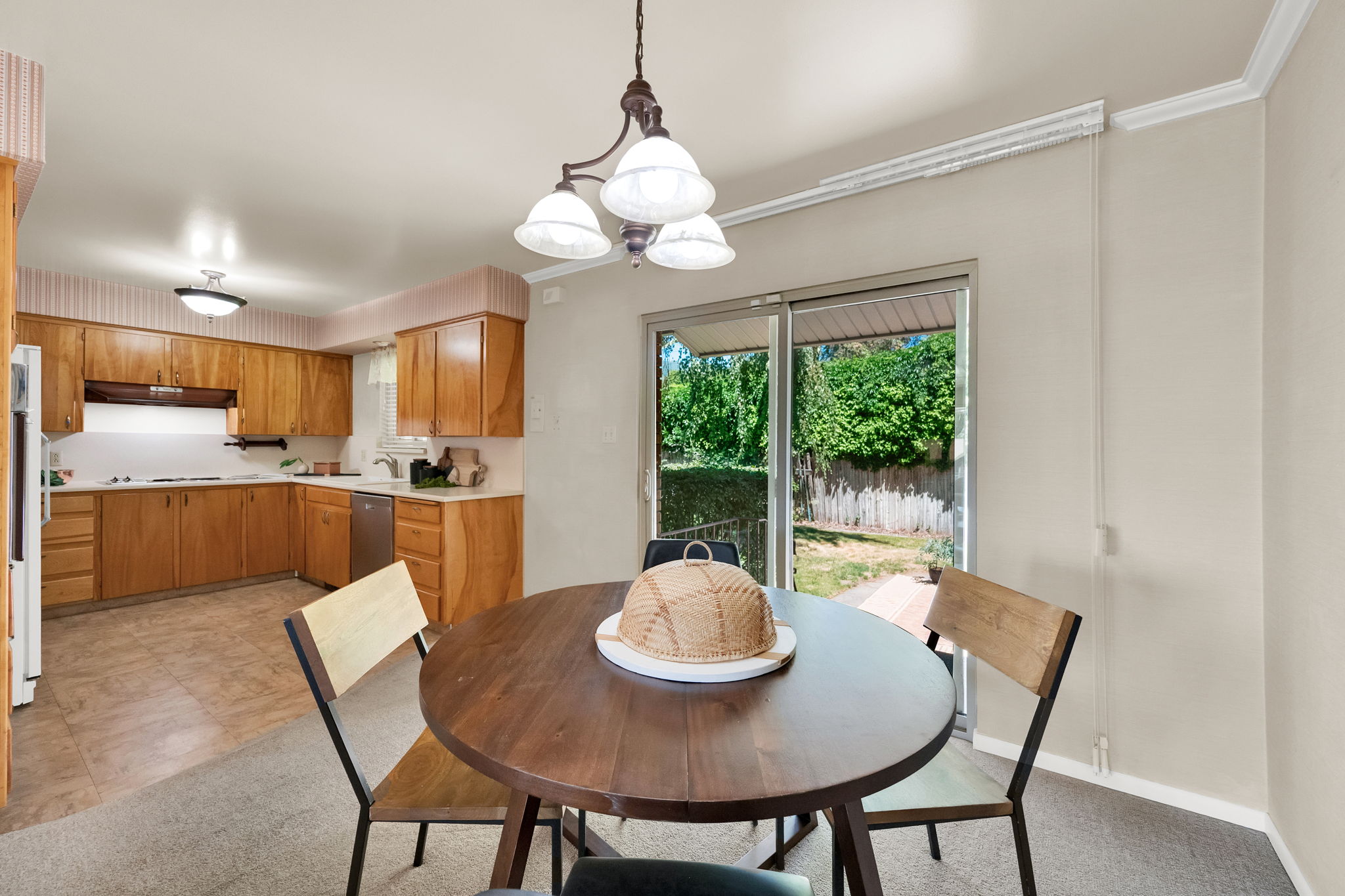 Dining and kitchen area, sliding door to patio