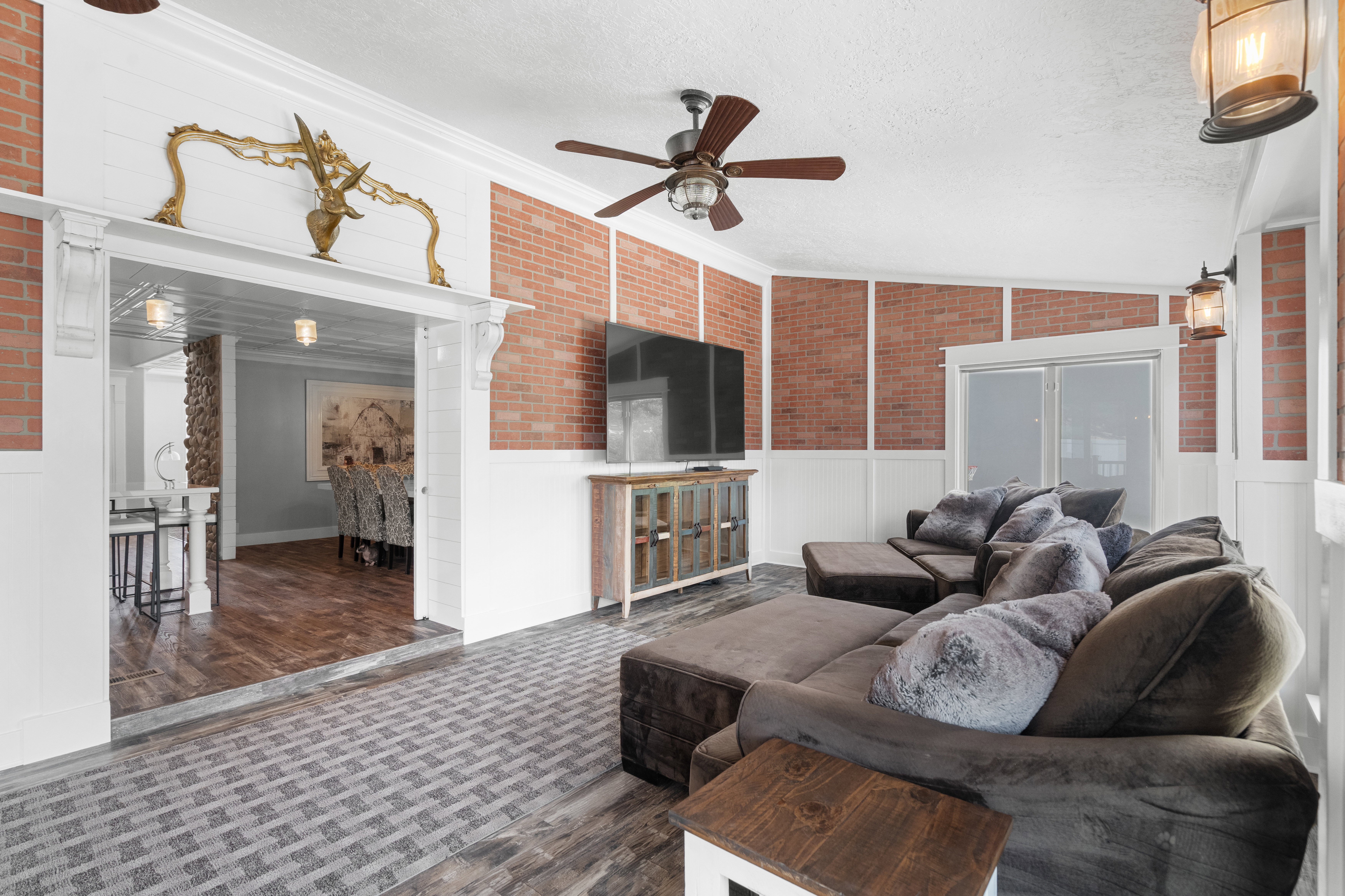 Spacious great room addition seamlessly extends from the kitchen