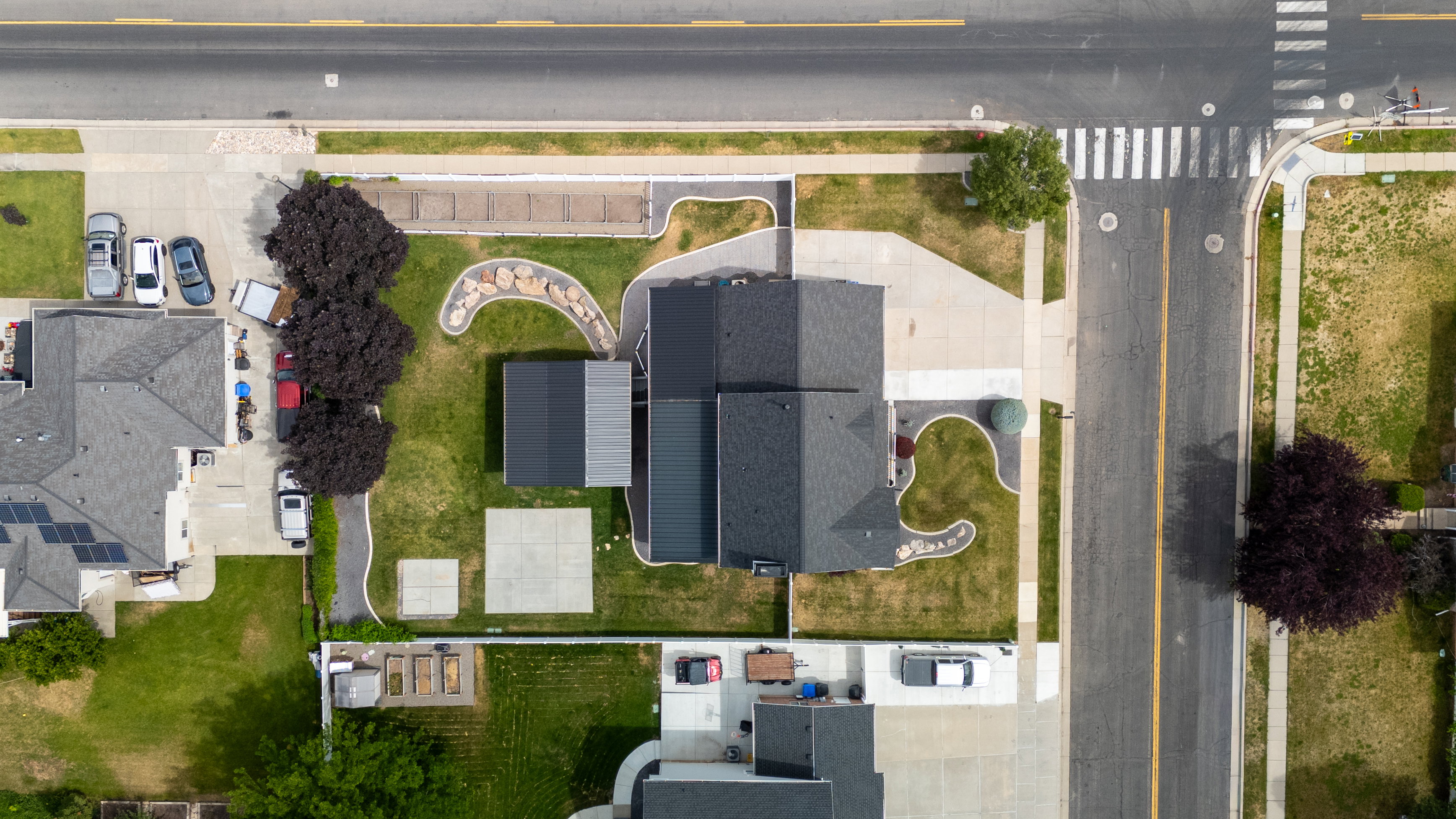 Aerial perspective highlighting the nice corner lot property on the block