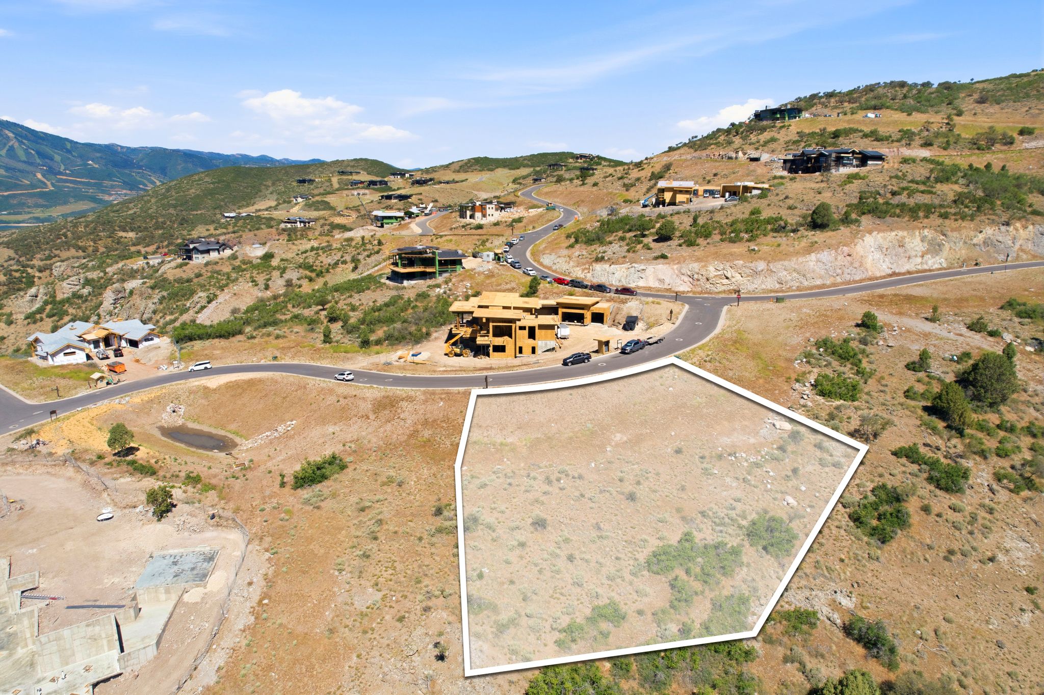 Expansive hillside lot featuring natural terrain and surrounding mountainous scenery