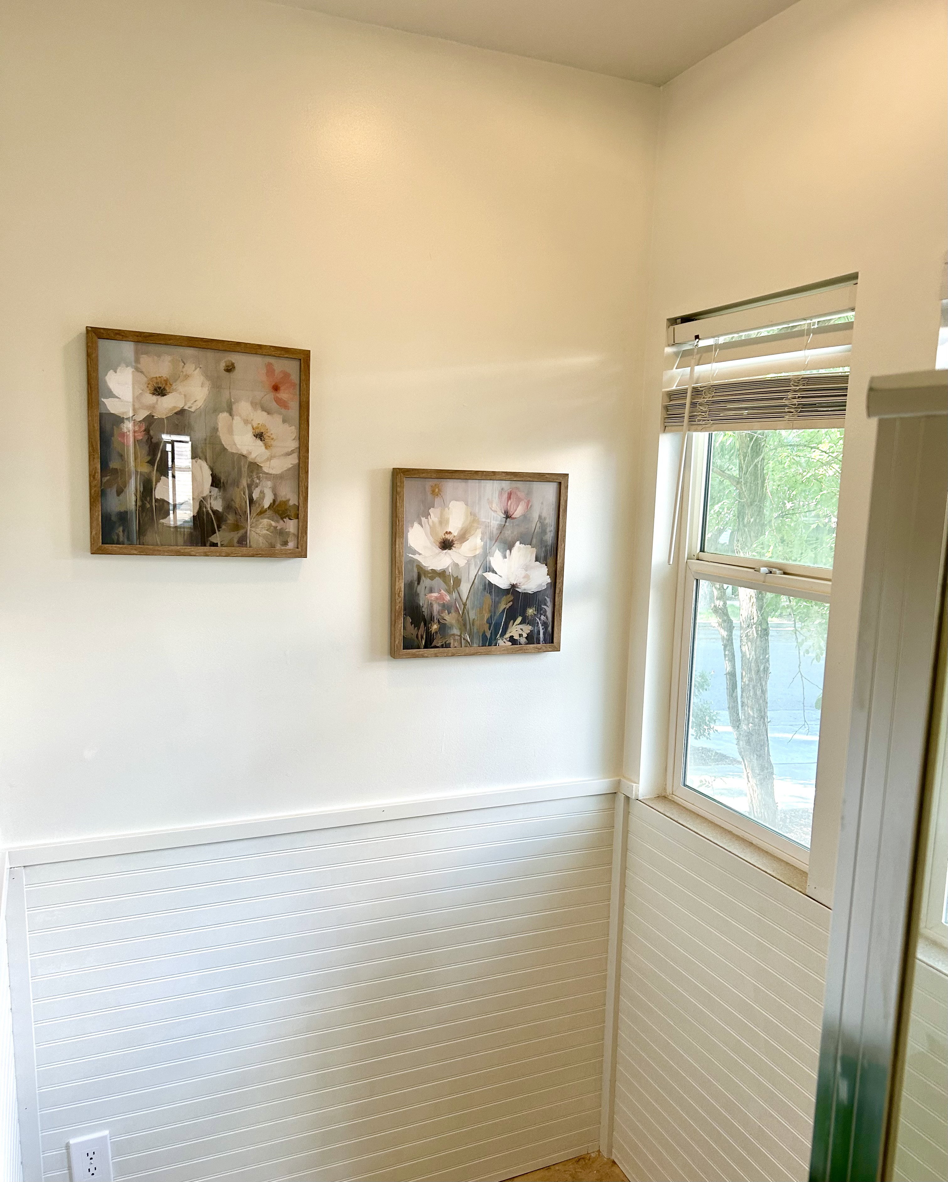 White beadboard wainscoting with a coordinating trim