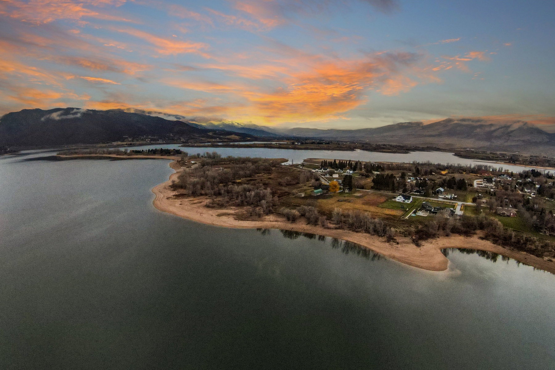 Waterside community featuring a sandy shoreline and water frontage