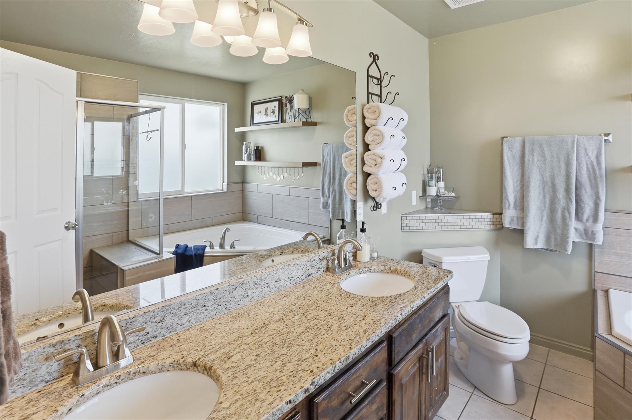Dual vanity with granite countertop and undermount sinks