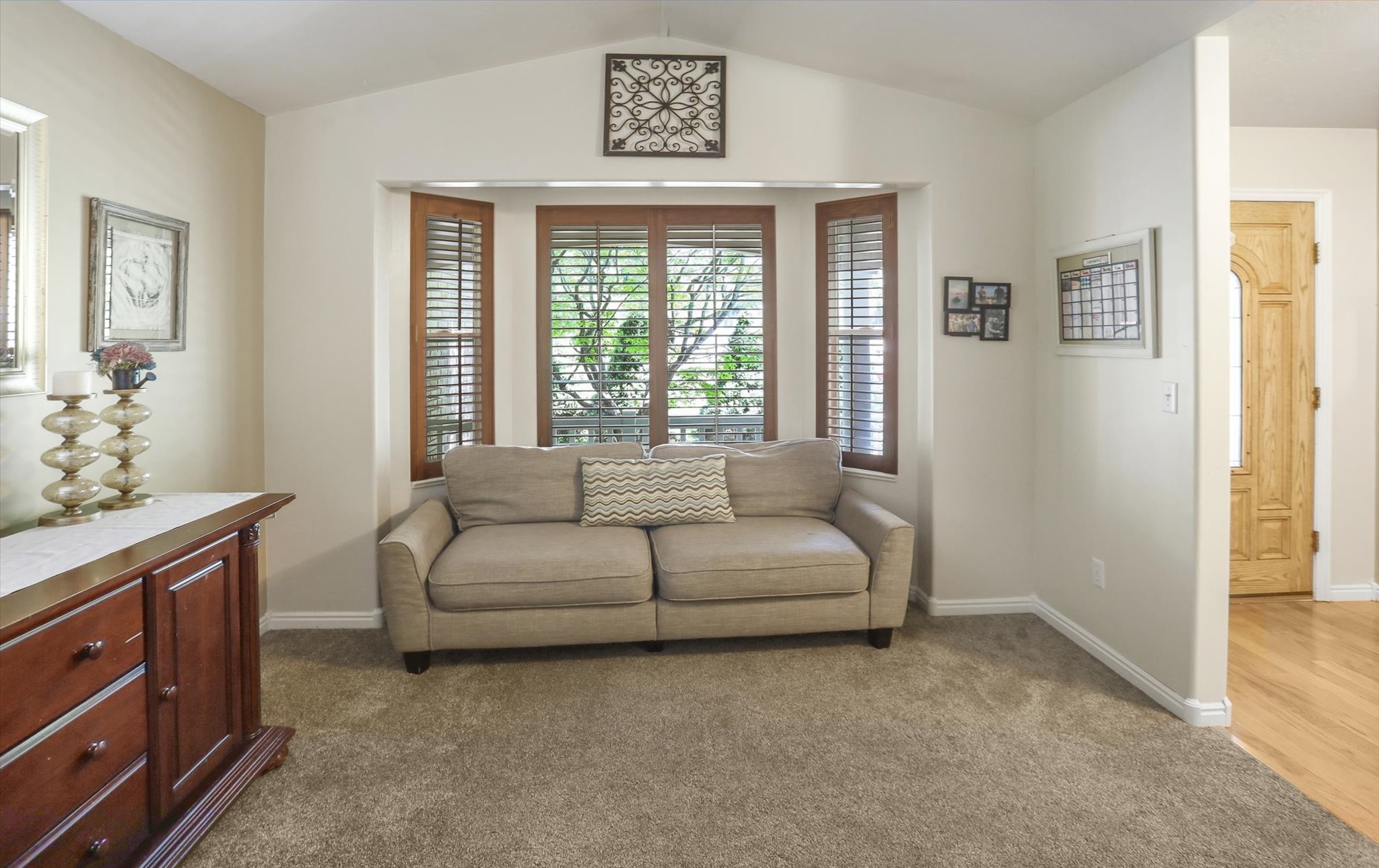 Bay window with wood-finish plantation shutters
